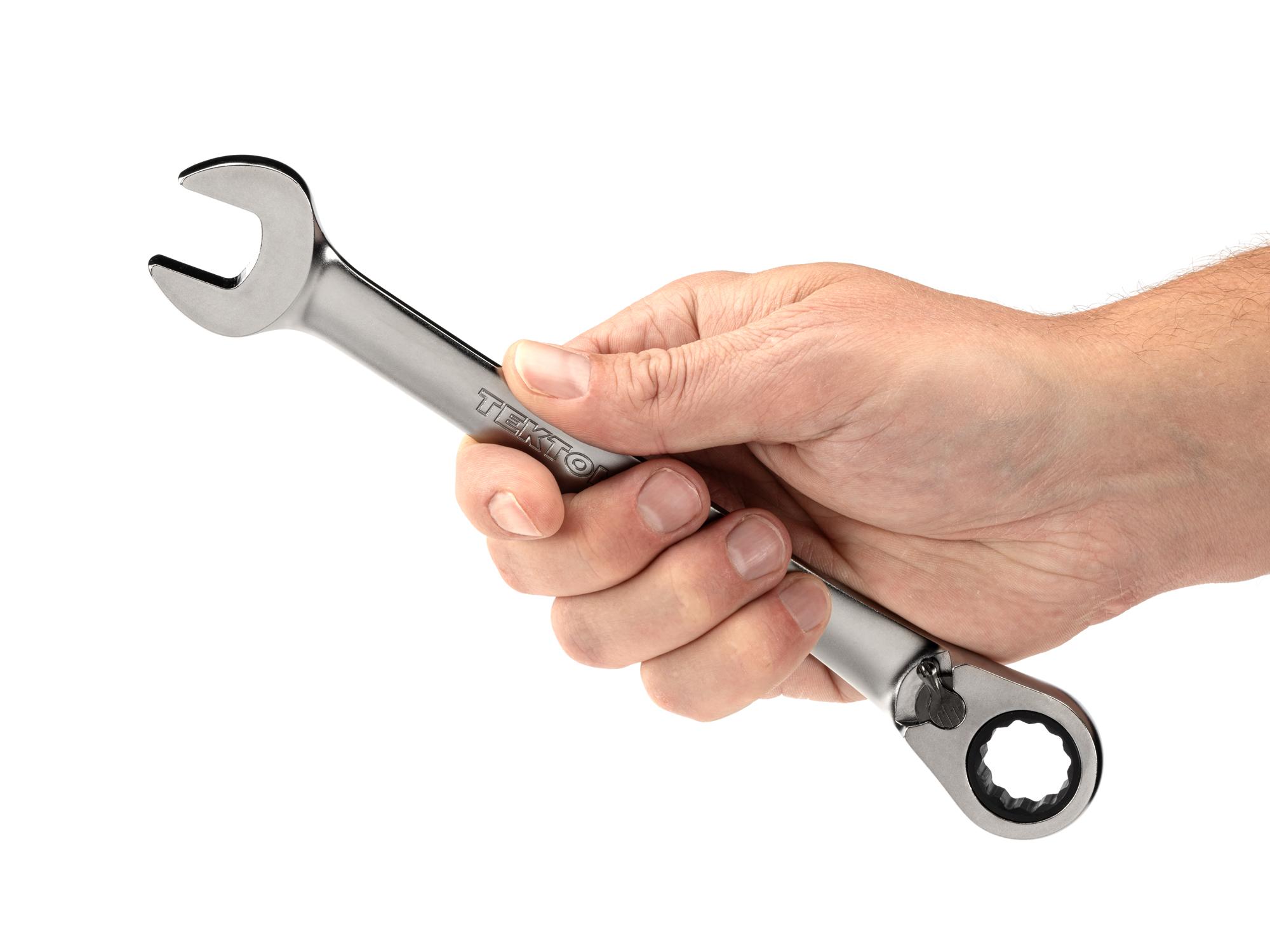 Person holding Tekton ratcheting combination wrench. Item #WRC23418