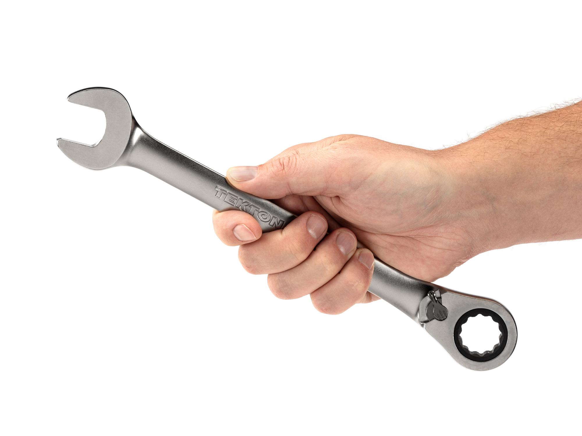 Person holding Tekton ratcheting combination wrench. Item #WRC23420
