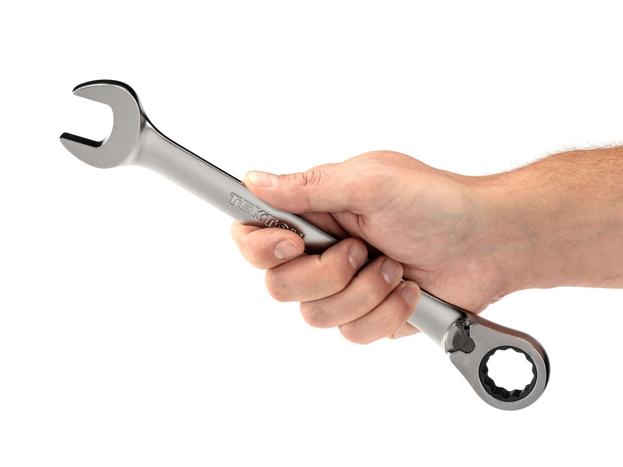 Person holding Tekton ratcheting combination wrench. Item #WRC23423