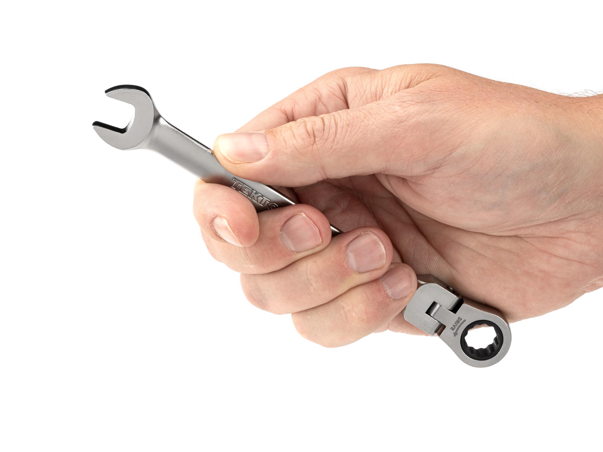 Person holding Tekton ratcheting combination wrench. Item #WRC26310