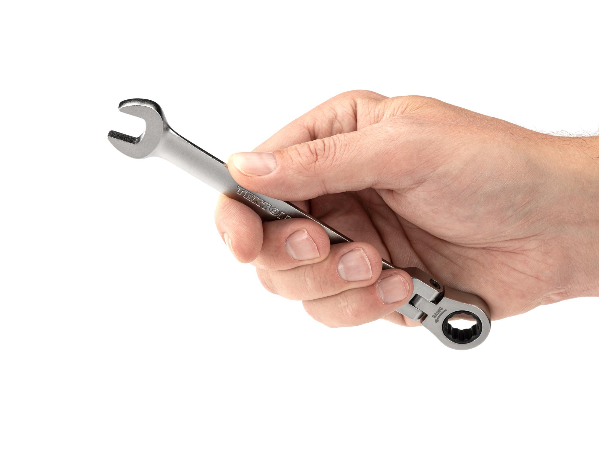 Person holding Tekton ratcheting combination wrench. Item #WRC26311