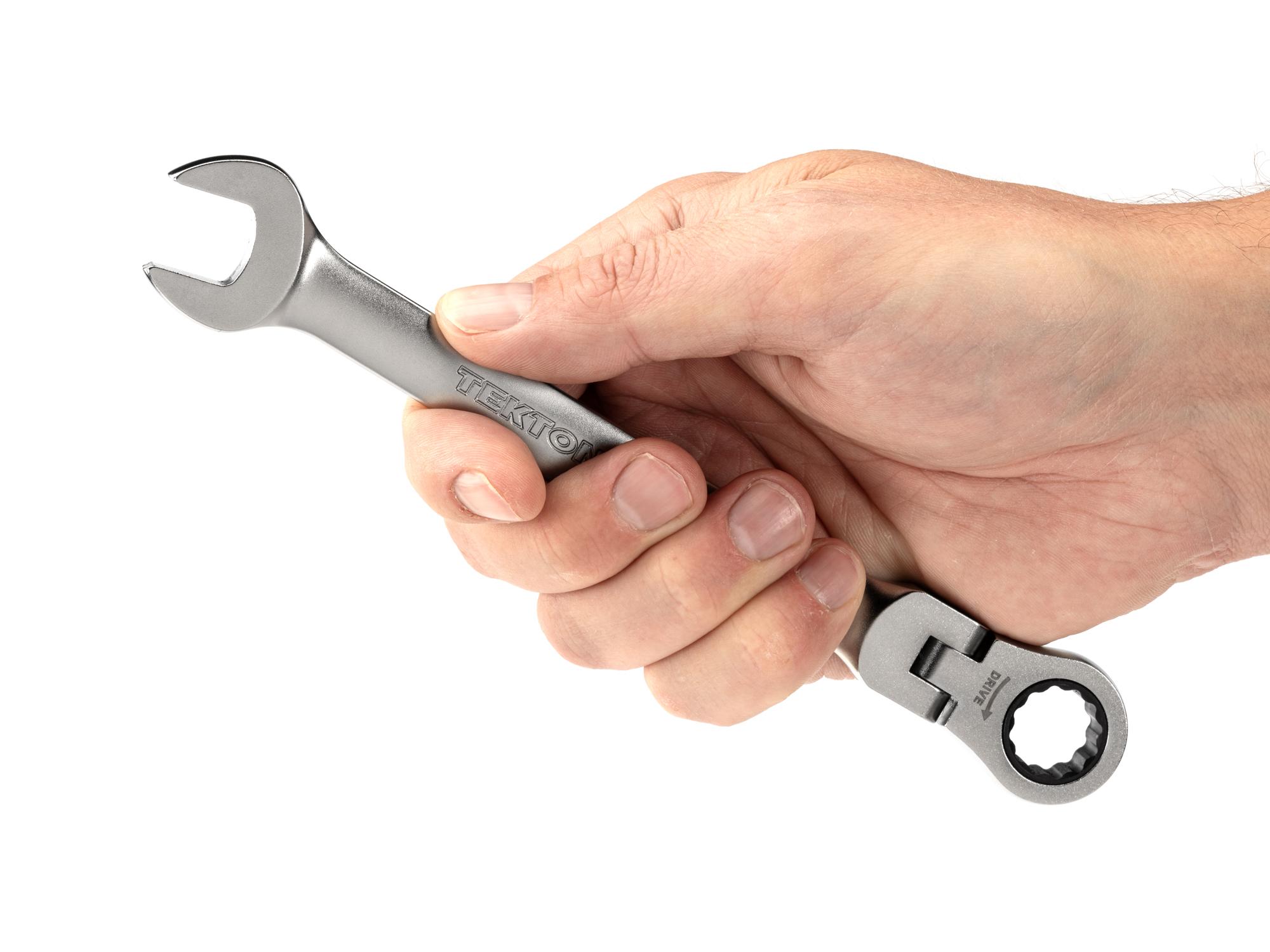 Person holding Tekton ratcheting combination wrench. Item #WRC26314