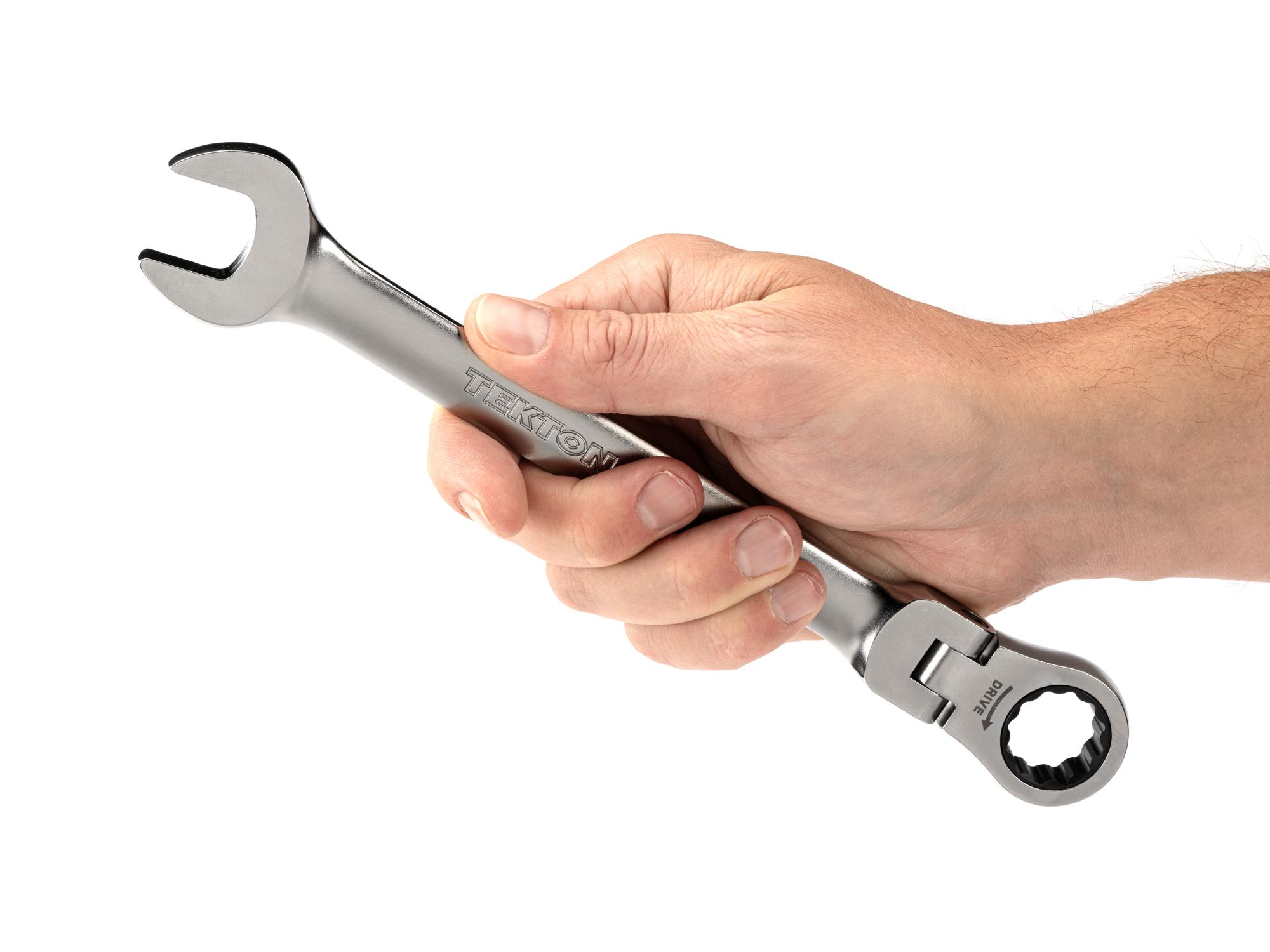 Person holding Tekton ratcheting combination wrench. Item #WRC26319