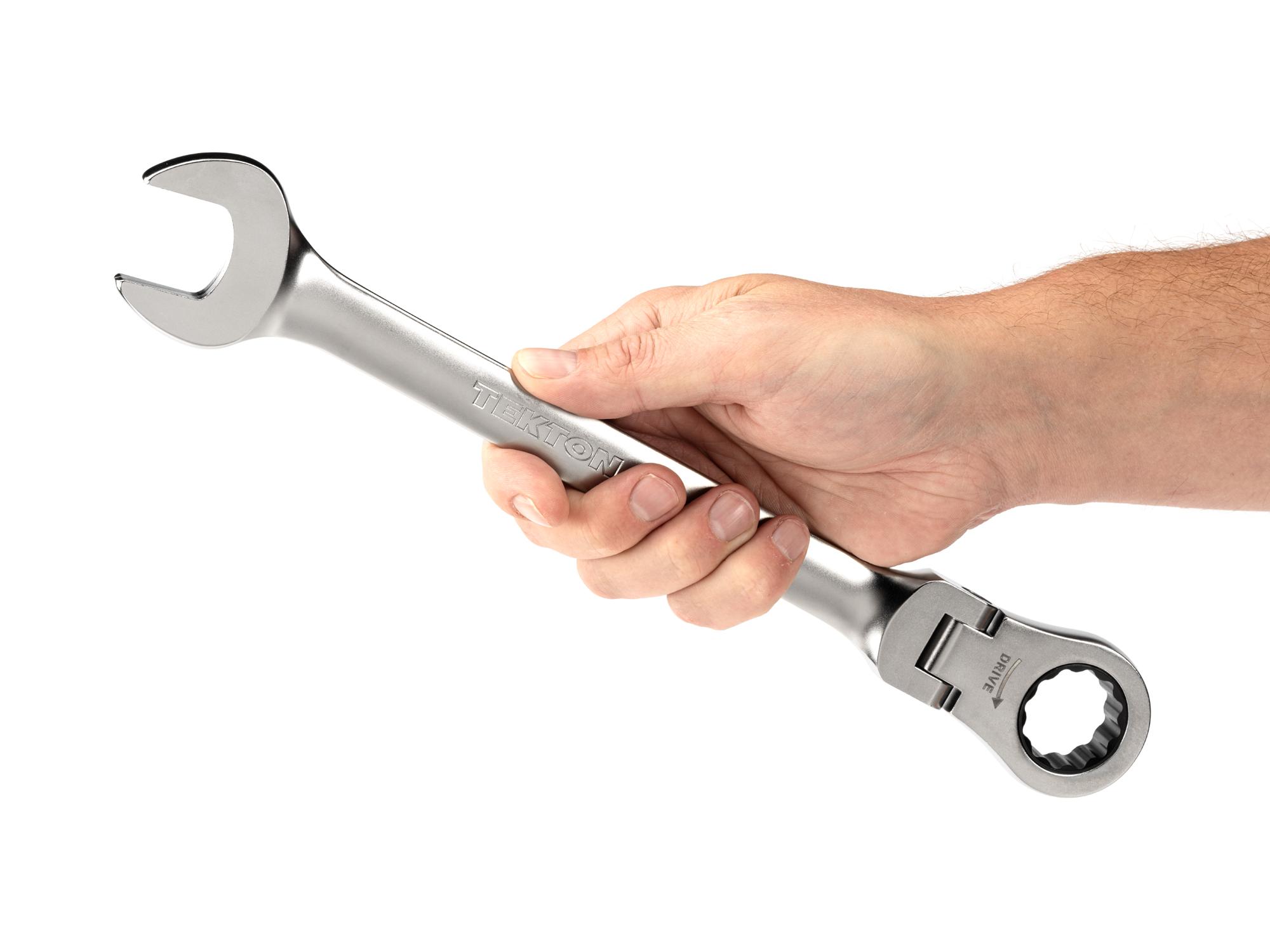 Person holding Tekton ratcheting combination wrench. Item #WRC26325