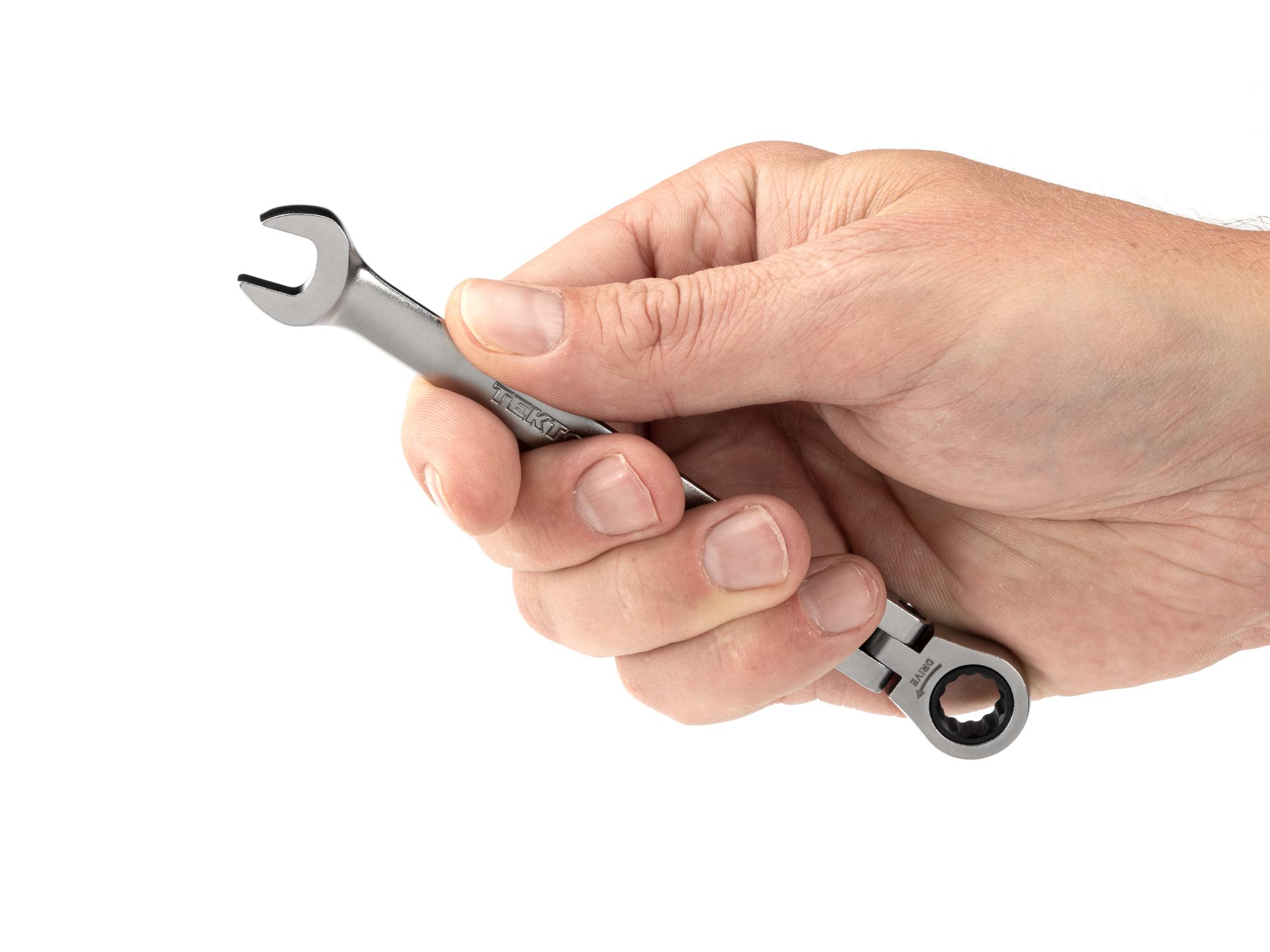 Person holding Tekton ratcheting combination wrench. Item #WRC26409