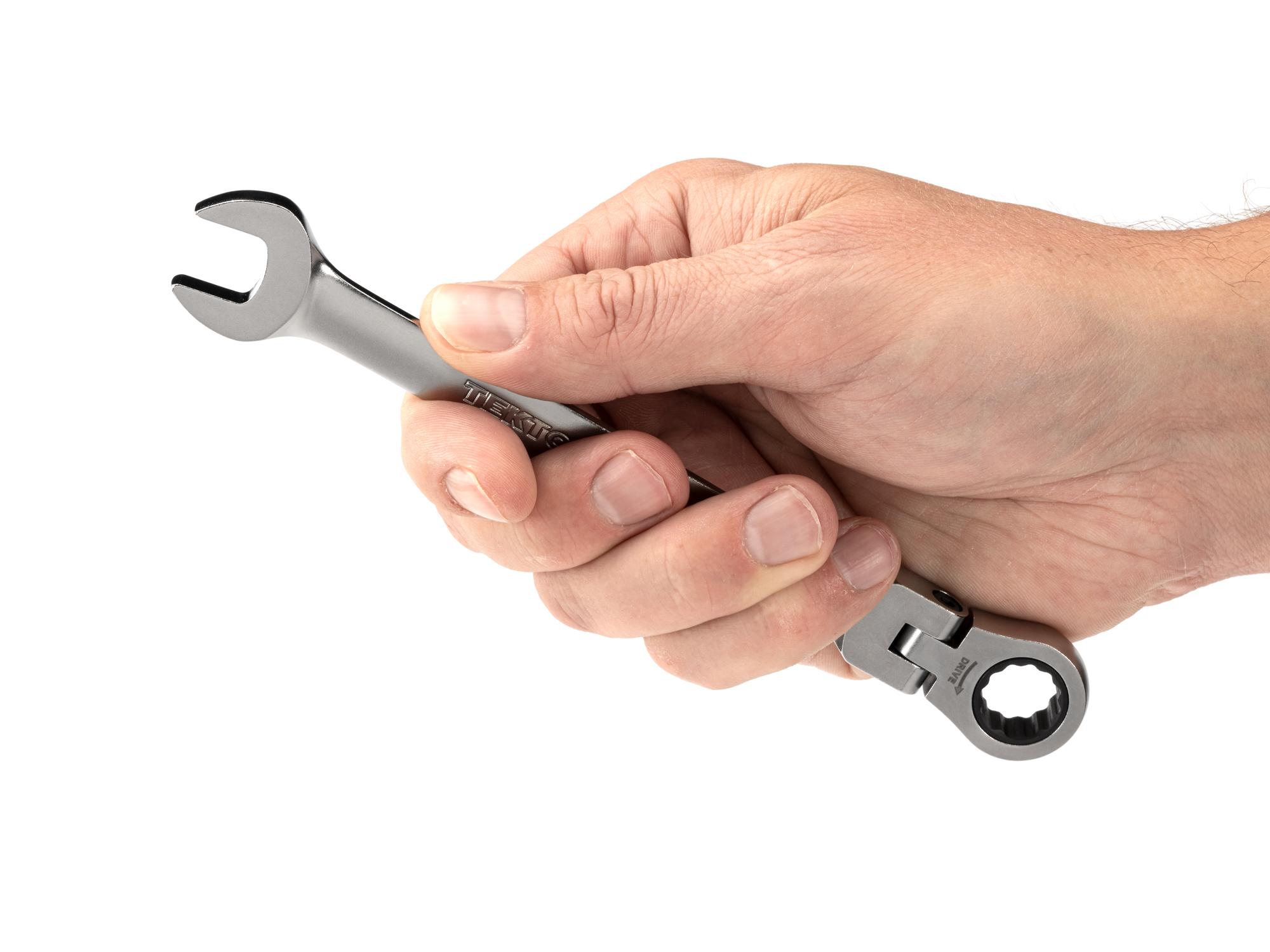 Person holding Tekton ratcheting combination wrench. Item #WRC26412