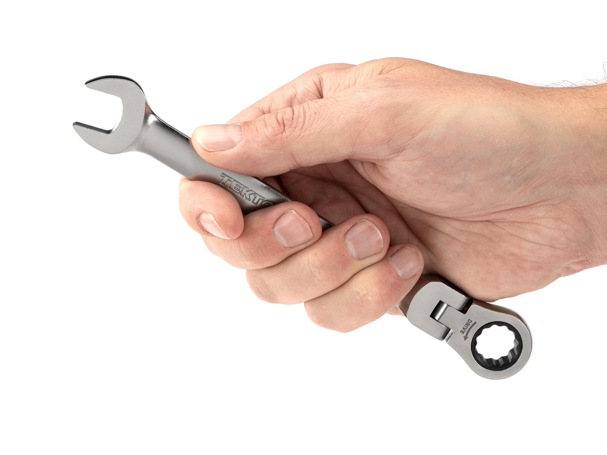 Person holding Tekton ratcheting combination wrench. Item #WRC26413