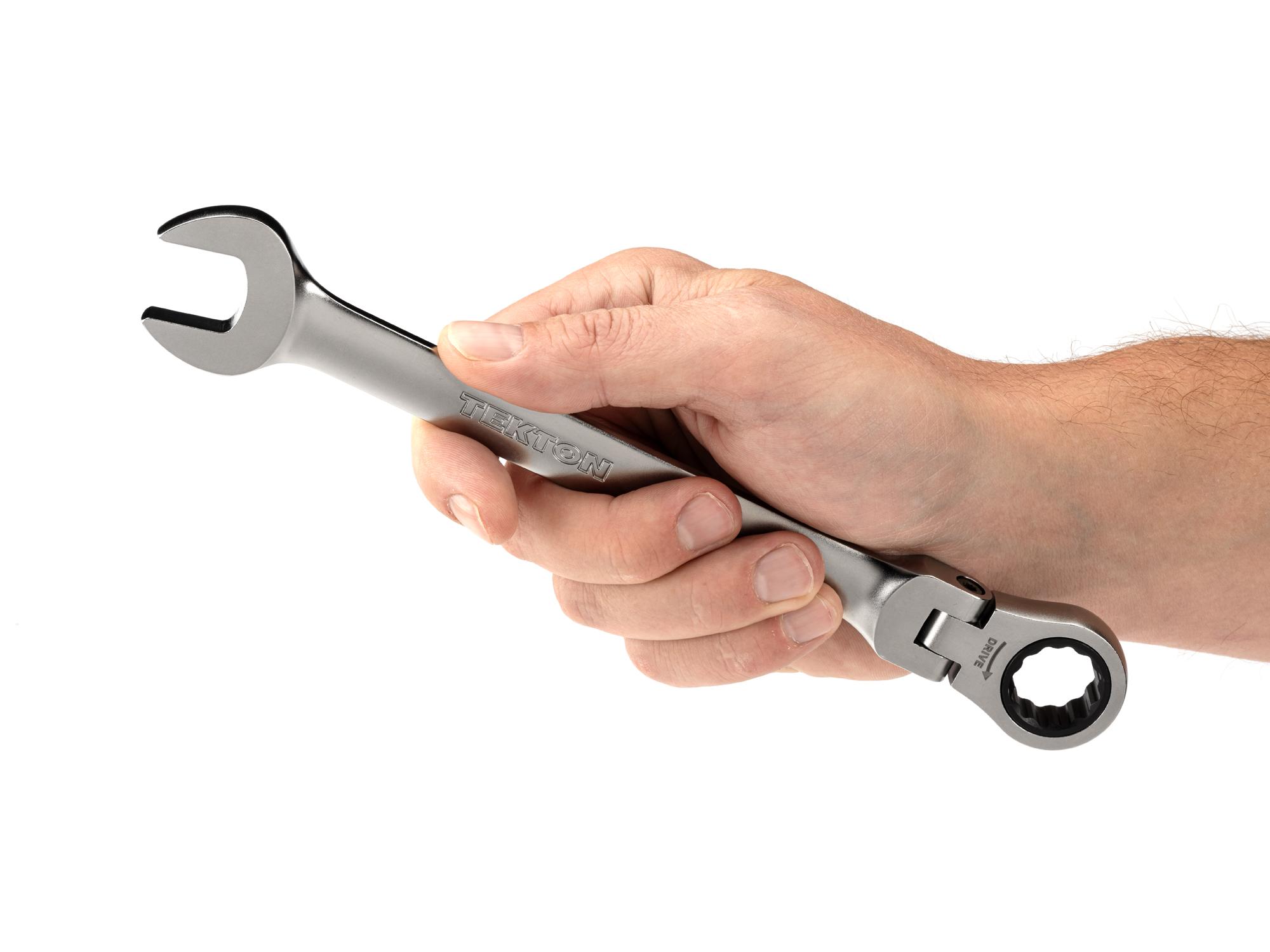 Person holding Tekton ratcheting combination wrench. Item #WRC26417