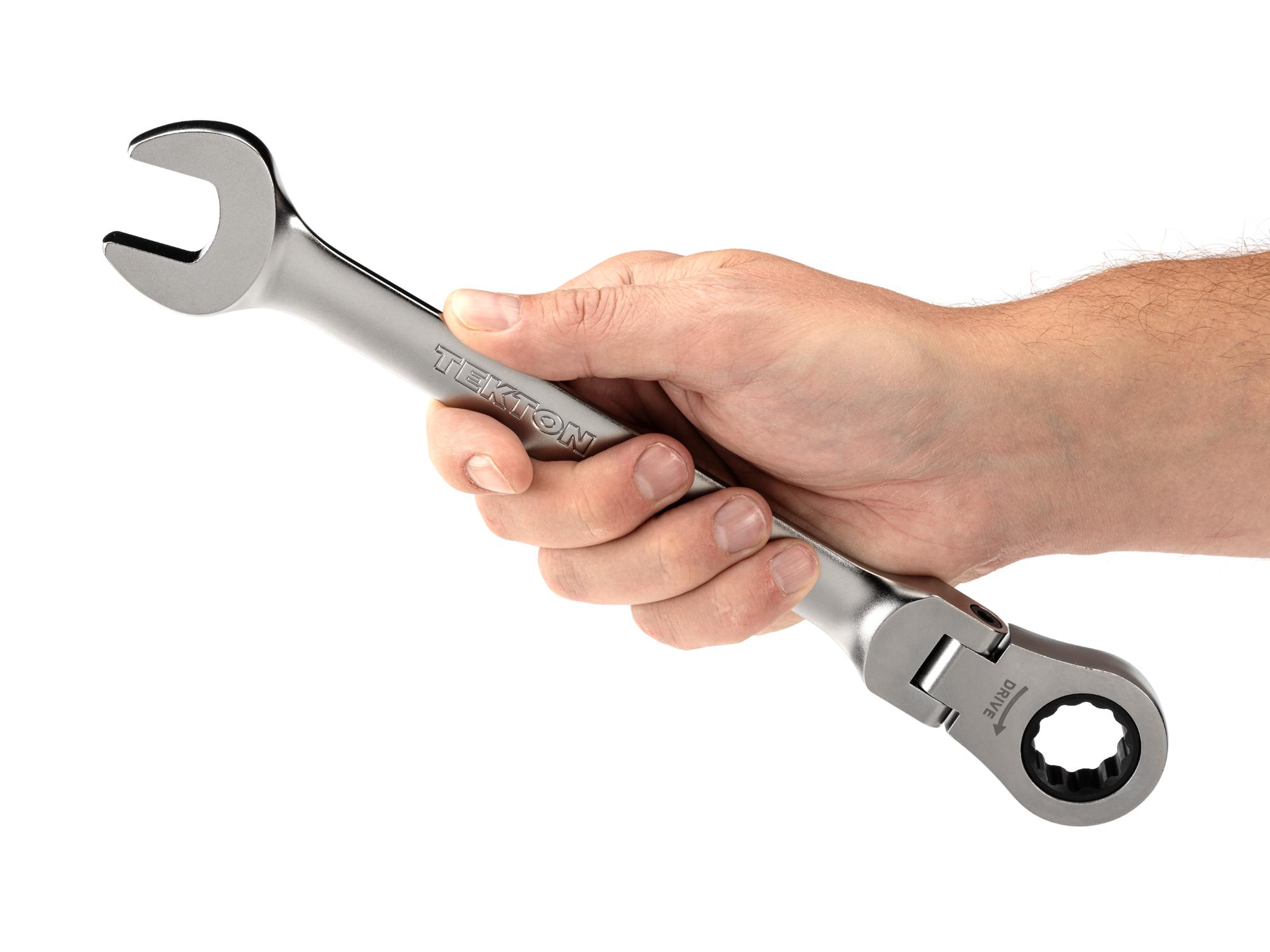 Person holding Tekton ratcheting combination wrench. Item #WRC26420