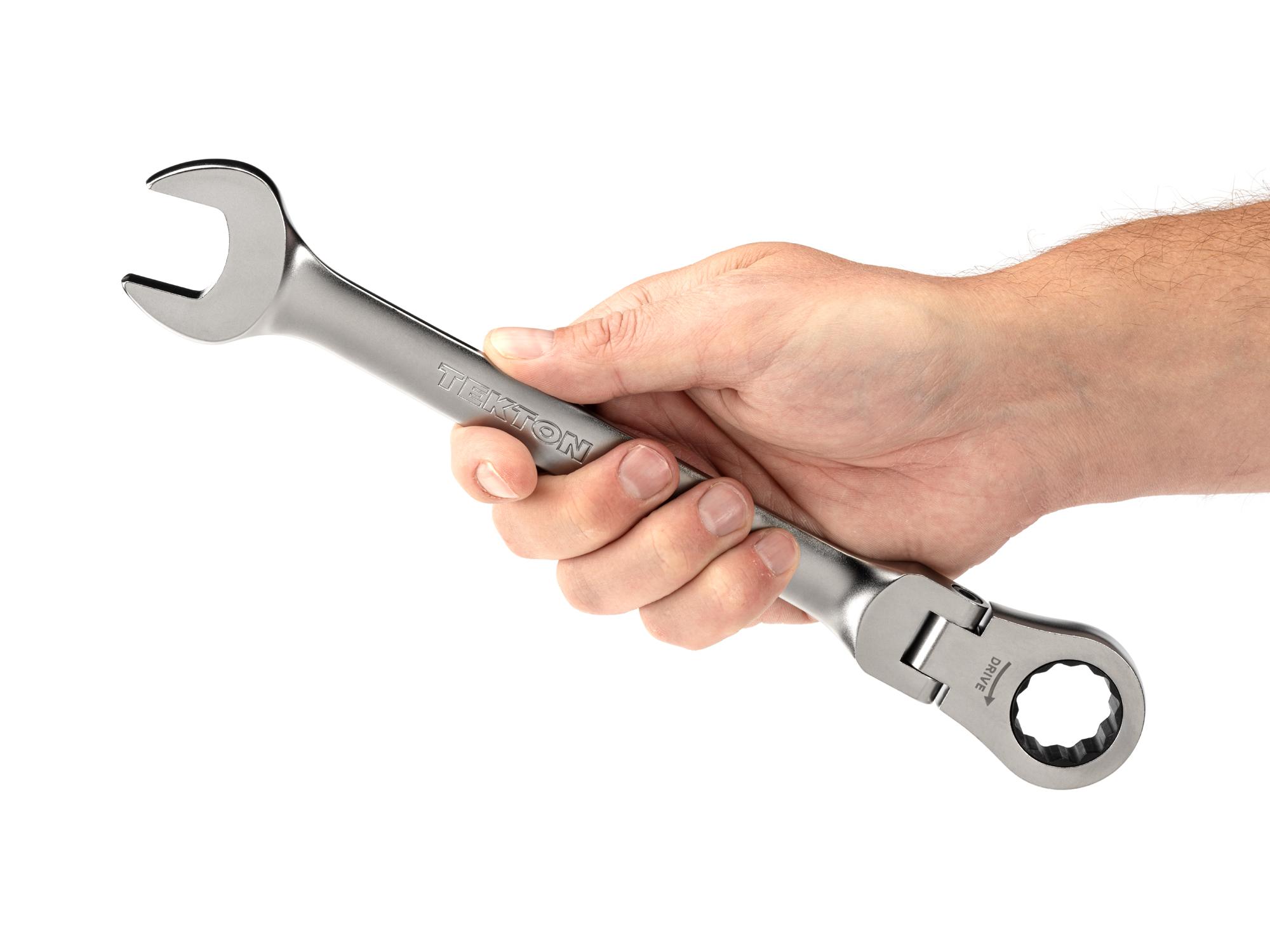 Person holding Tekton ratcheting combination wrench. Item #WRC26423