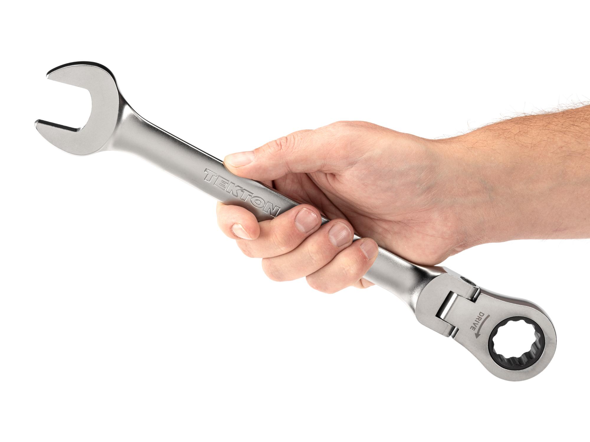 Person holding Tekton ratcheting combination wrench. Item #WRC26424