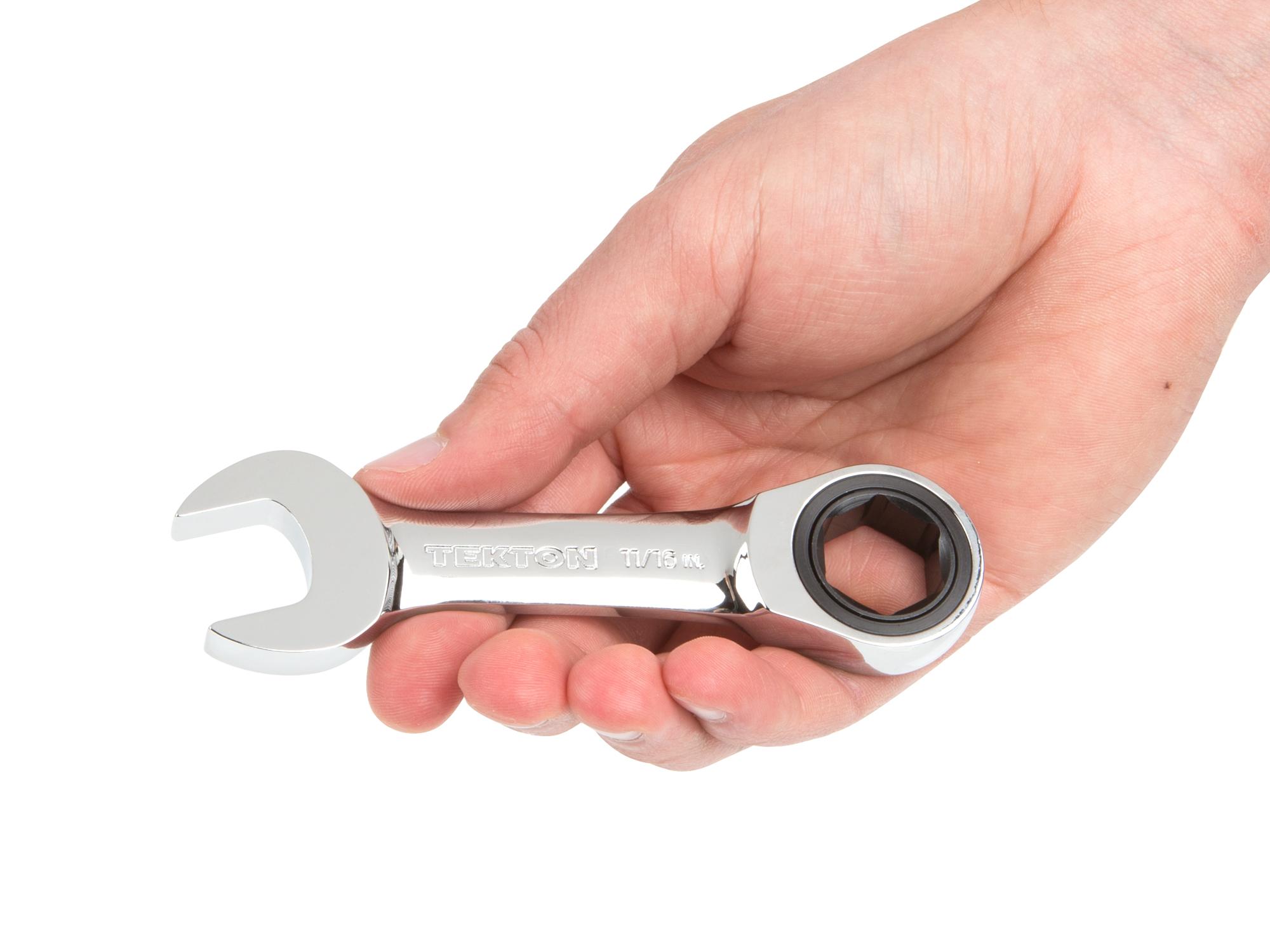 Person holding Tekton ratcheting combination wrench. Item #WRN50013