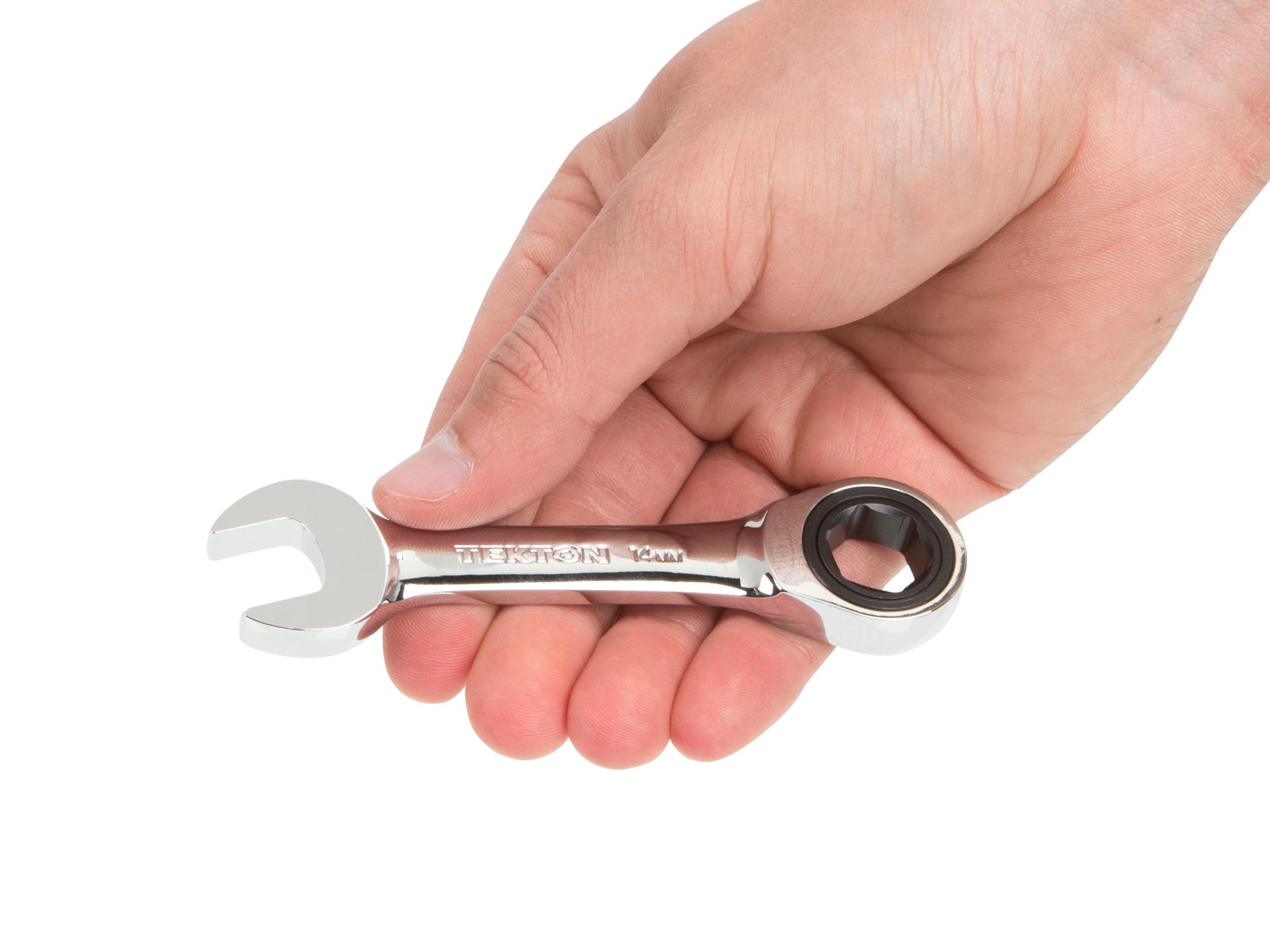 Person holding Tekton ratcheting combination wrench. Item #WRN50114