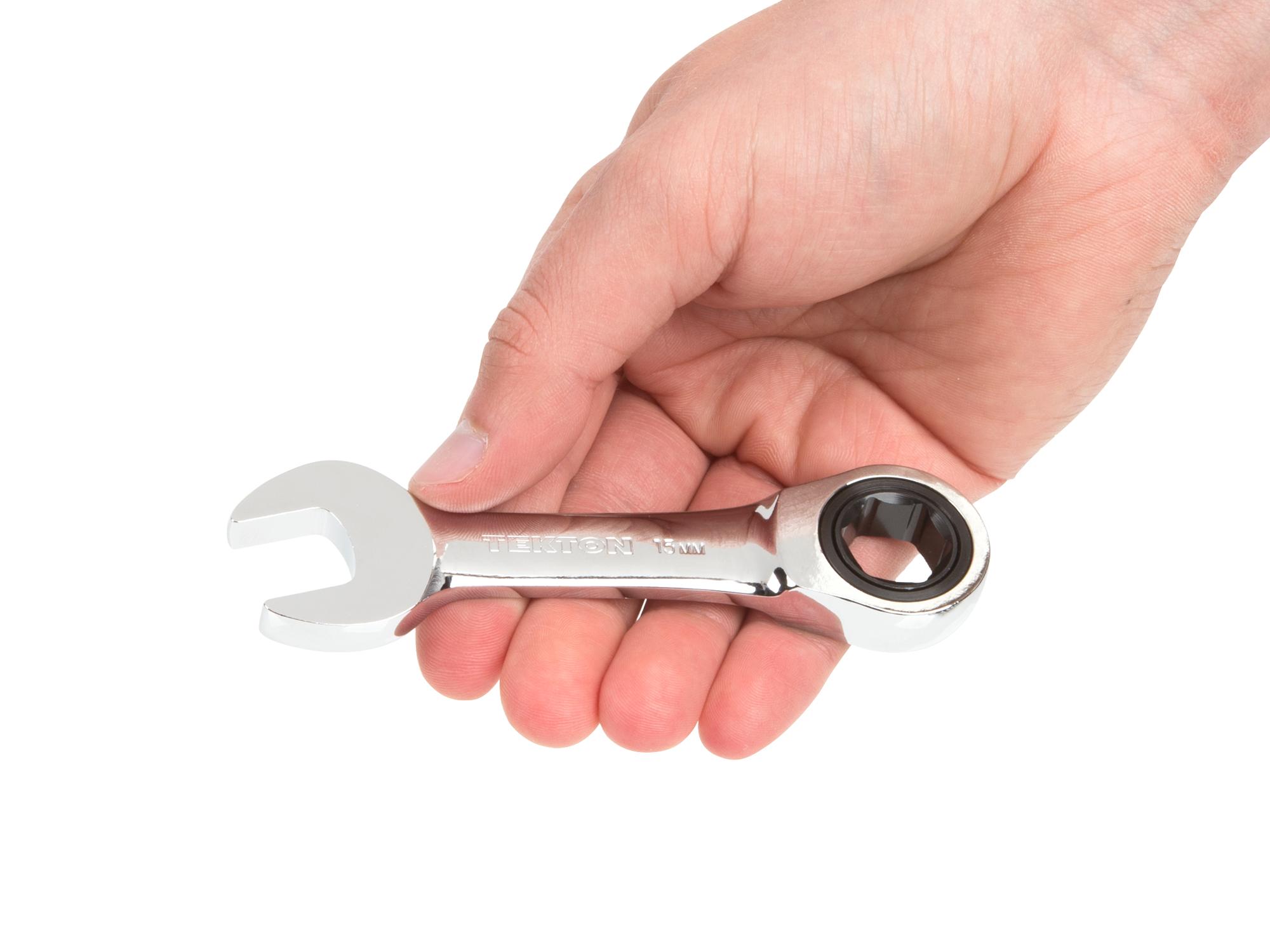 Person holding Tekton 15 millimeter ratcheting combination wrench set. Item #WRN50115