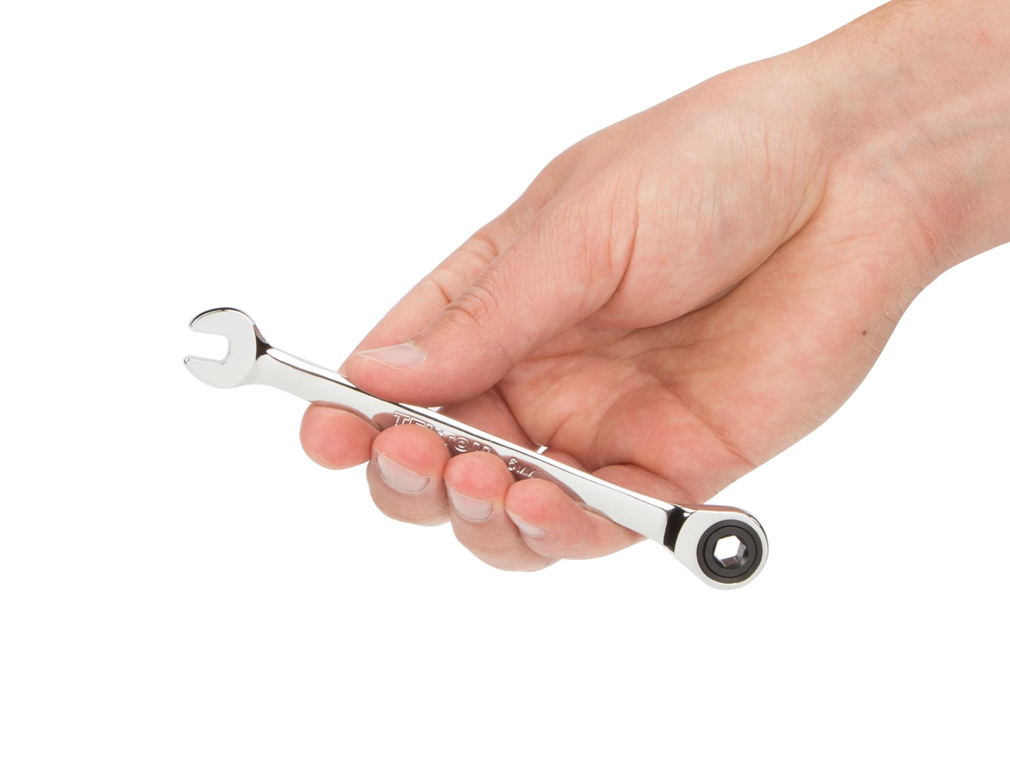Person holding Tekton ratcheting combination wrench. Item #WRN53106