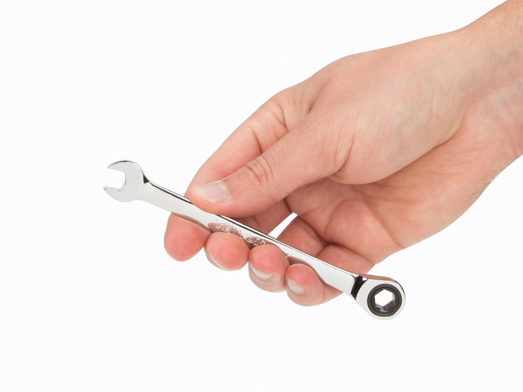 Person holding Tekton ratcheting combination wrench. Item #WRN53108