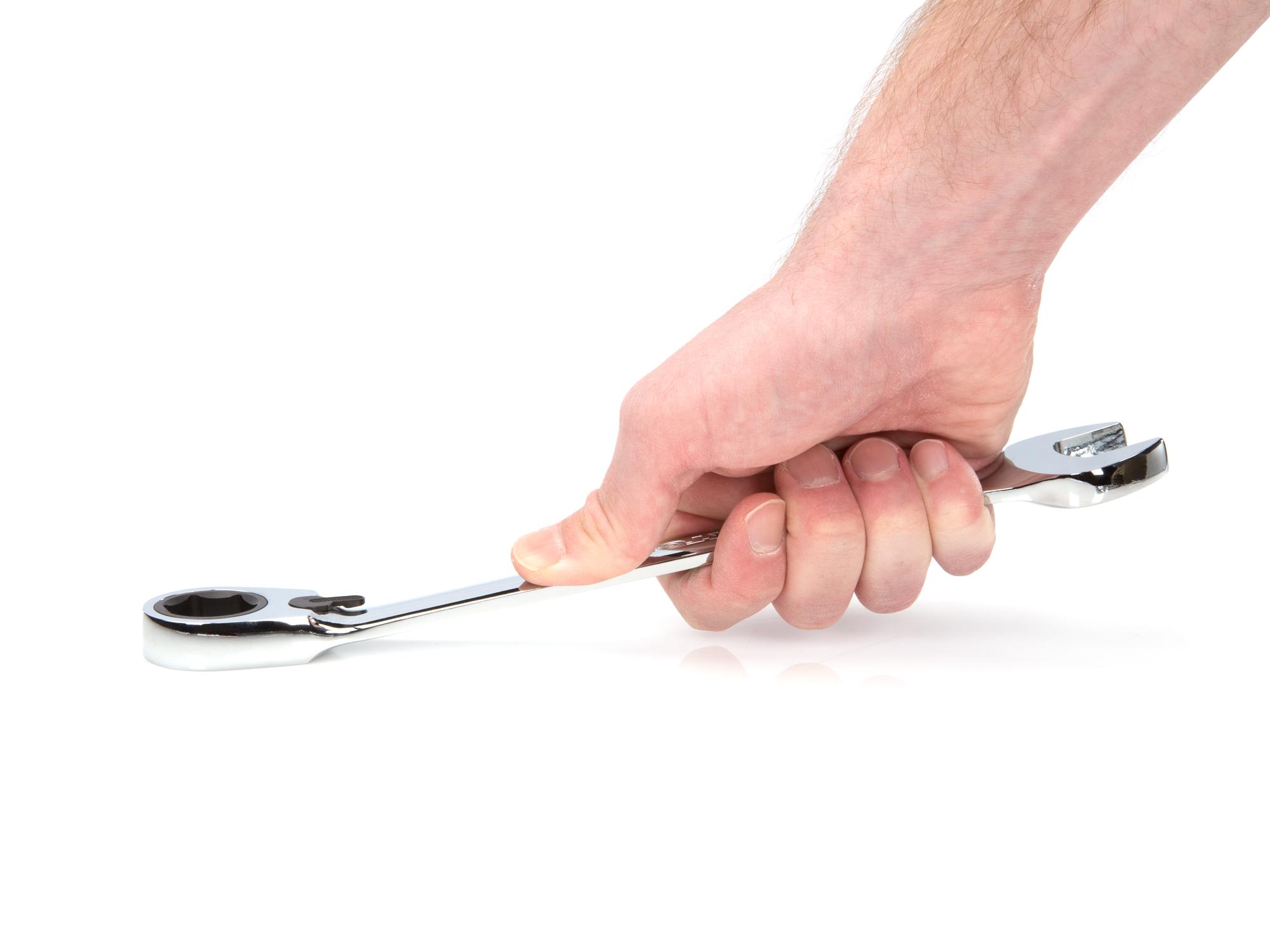 Person holding Tekton ratcheting combination wrench. Item #WRN56120