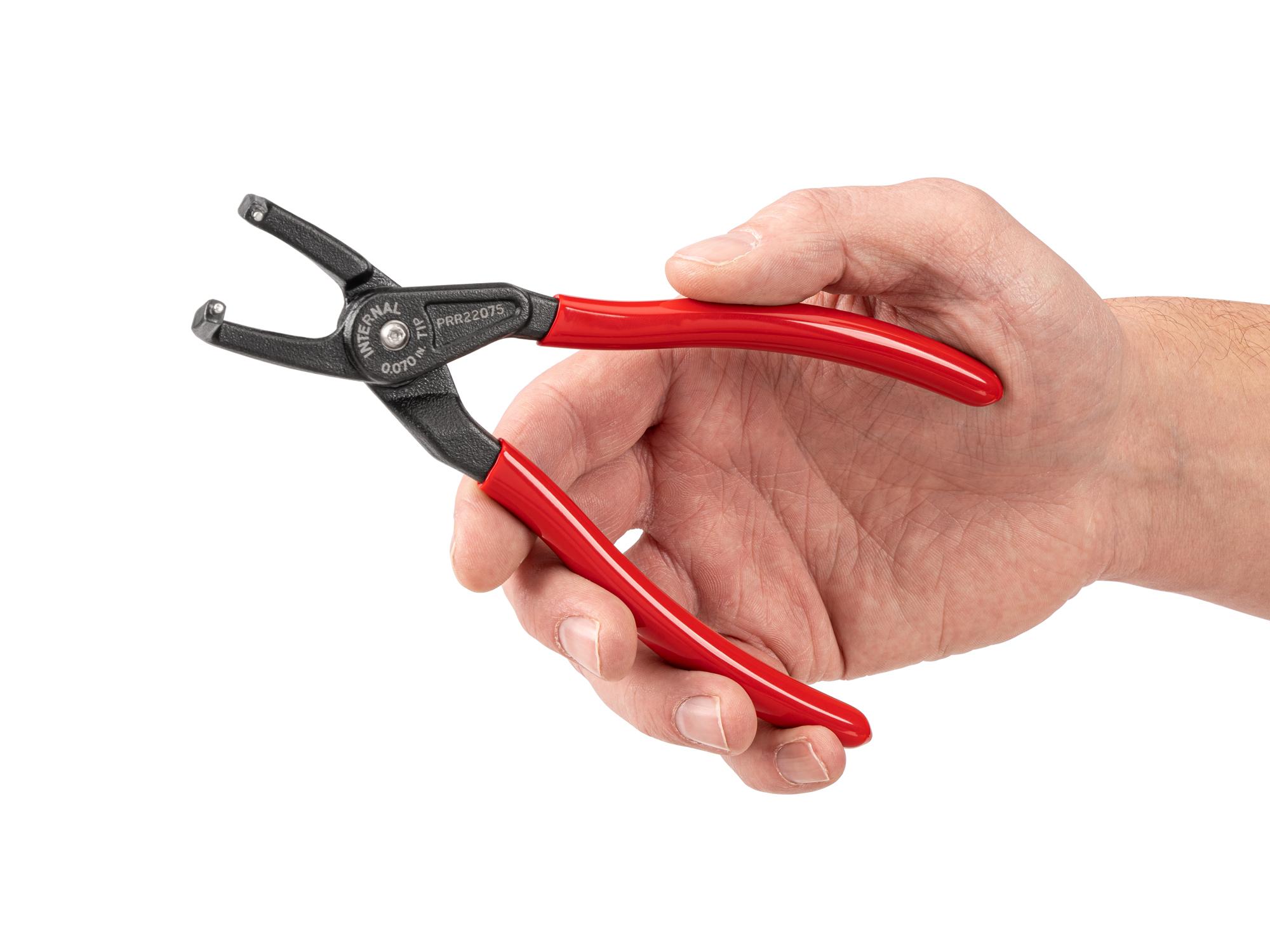 Person holding Tekton 7 inch retaining ring pliers. Item #PRR22075