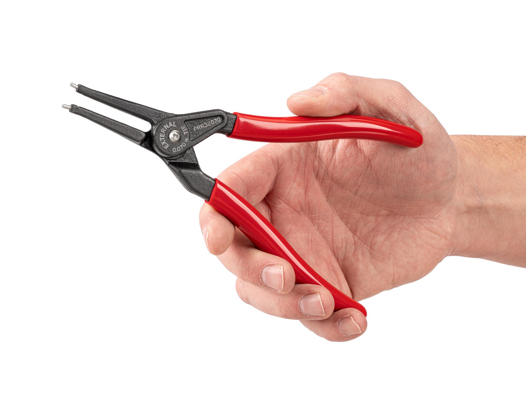 Person holding Tekton 7 inch retaining ring pliers. Item #PRR32070