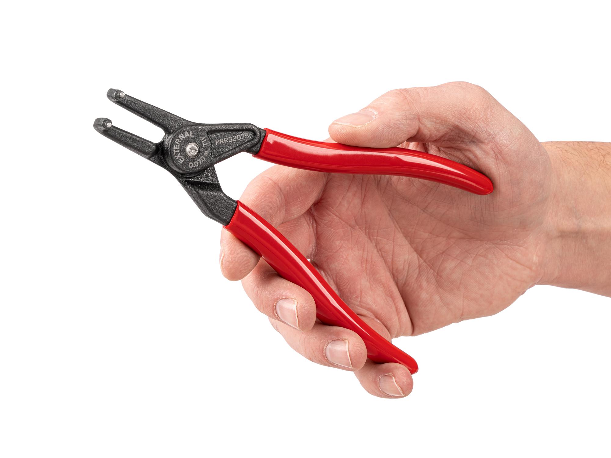 Person holding Tekton 7 inch retaining ring pliers. Item #PRR32075