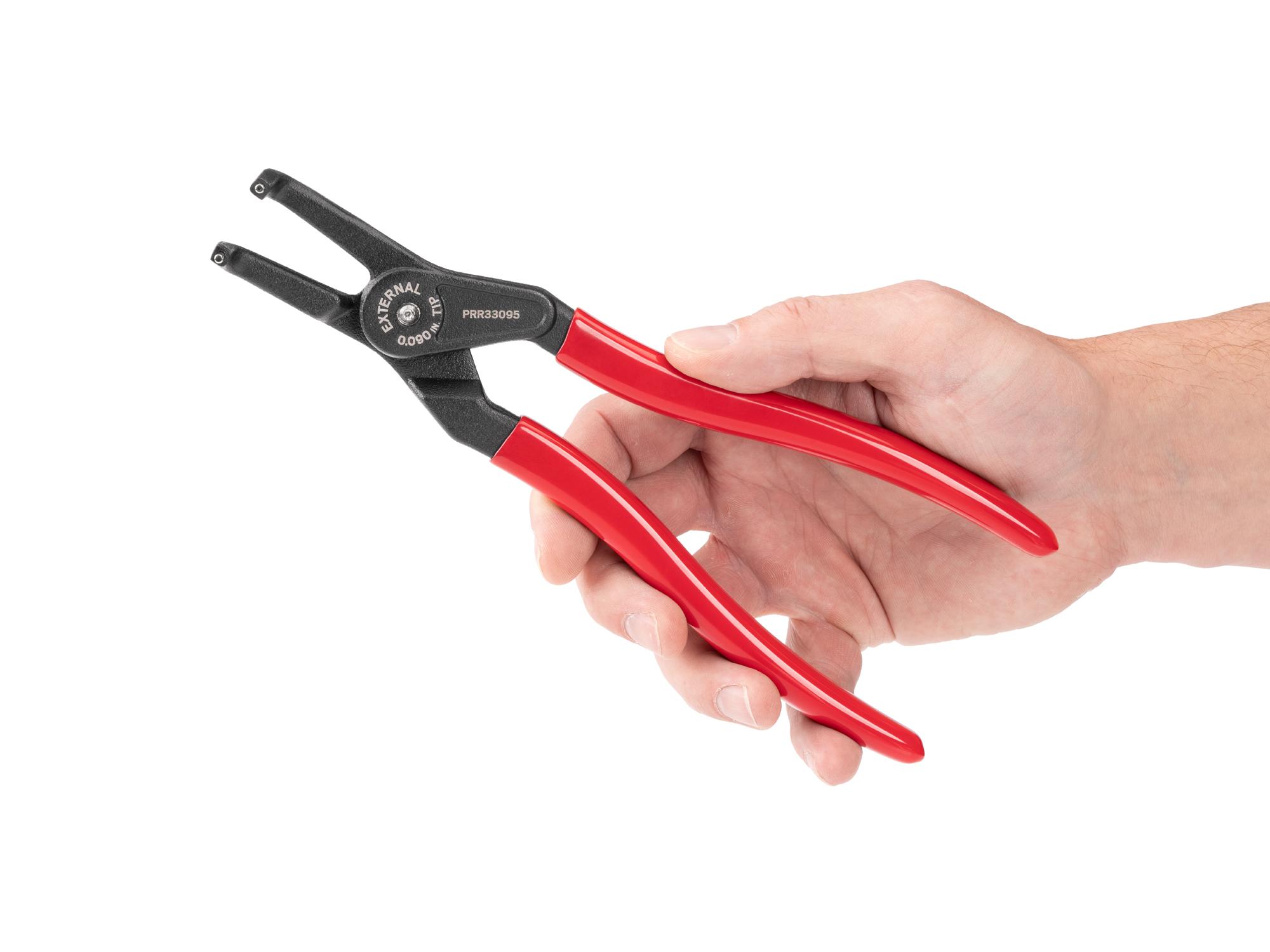 Person holding Tekton 10 inch retaining ring pliers. Item #PRR33095