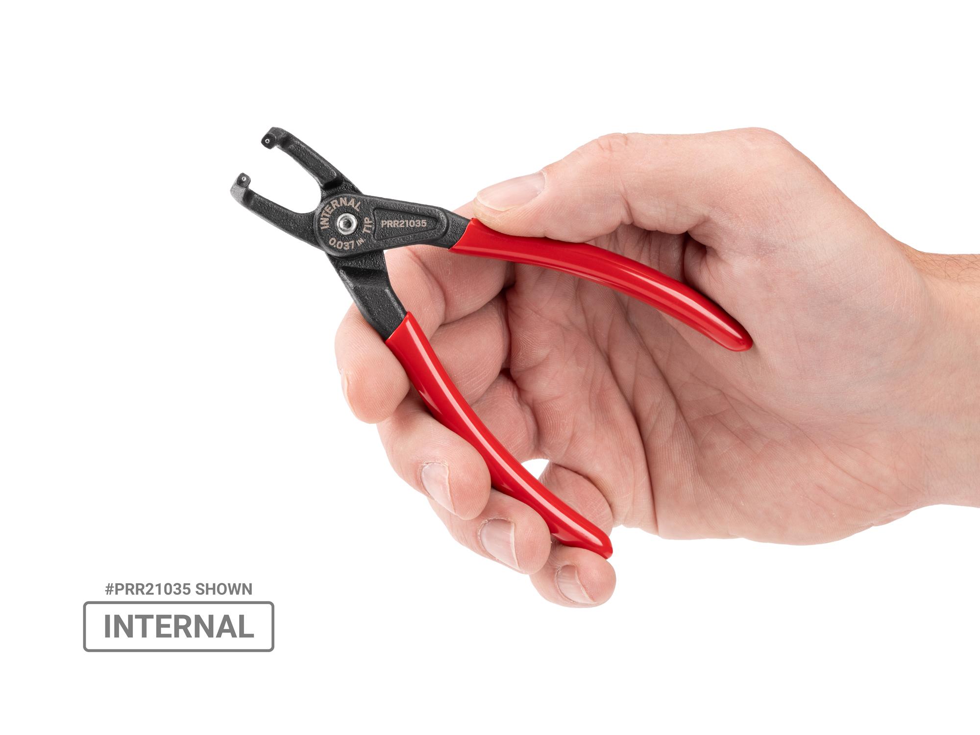 Person holding Tekton 5 inchh (0.037 inch tips) retaining ring pliers set. Item #PRR90009