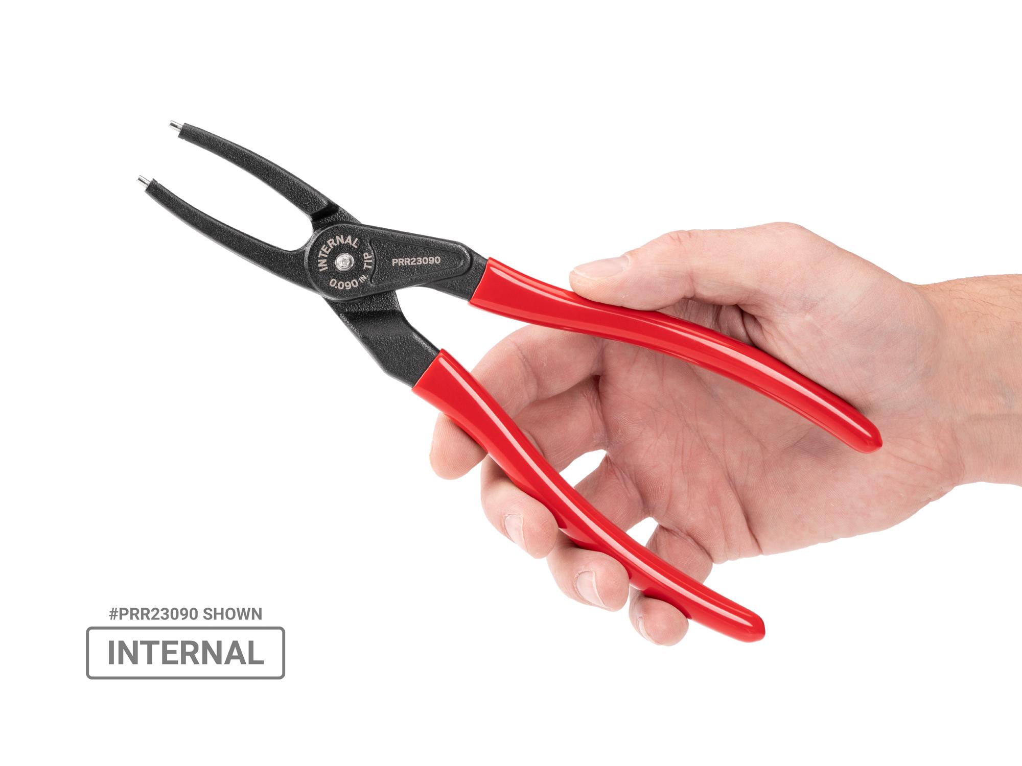 Person holding Tekton 9 inchh (0.090 inch tips) retaining ring pliers set. Item #PRR90018