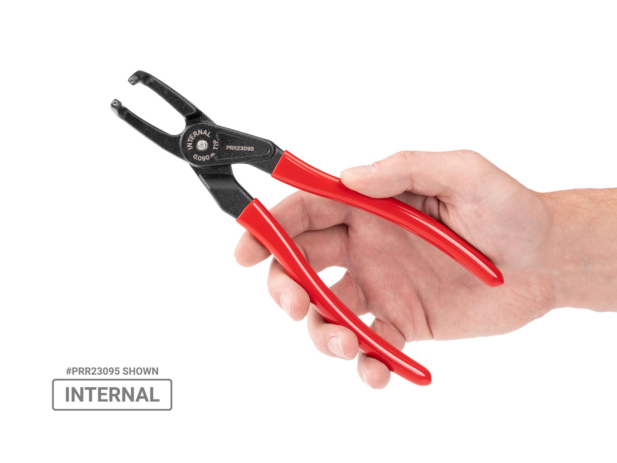 Person holding Tekton 9 inchh (0.090 inch tips) retaining ring pliers set. Item #PRR90019
