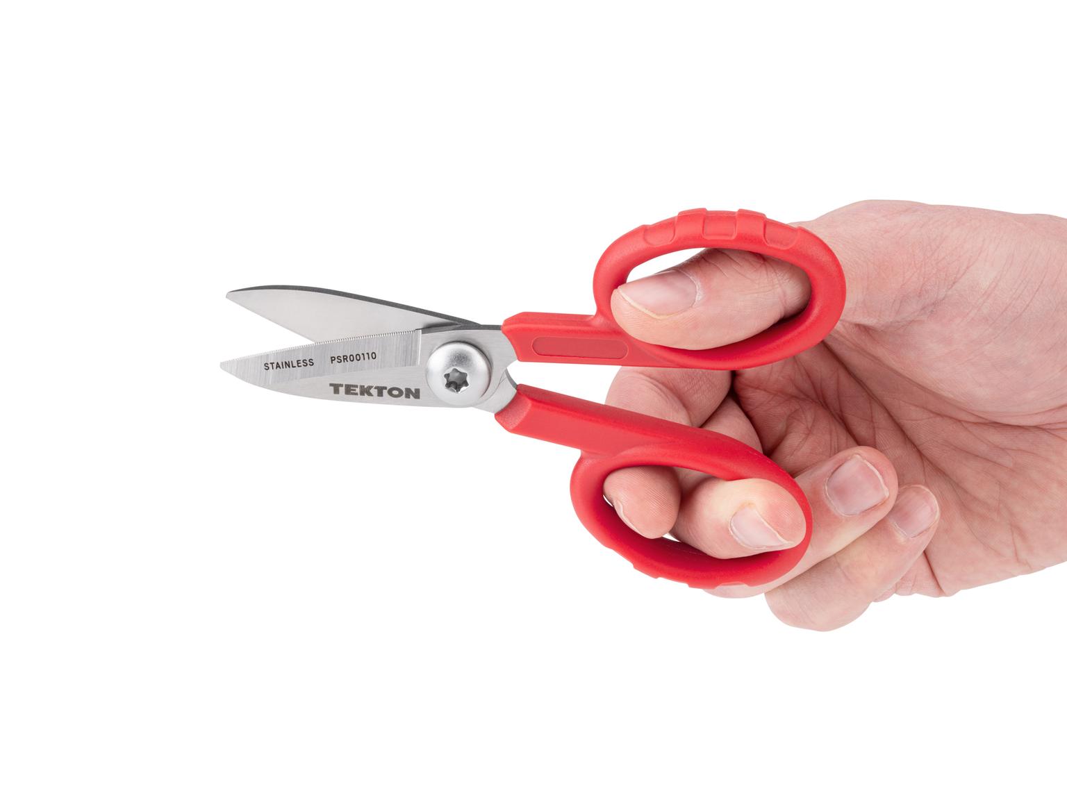 Person holding Tekton scissors. Item #PSR00110