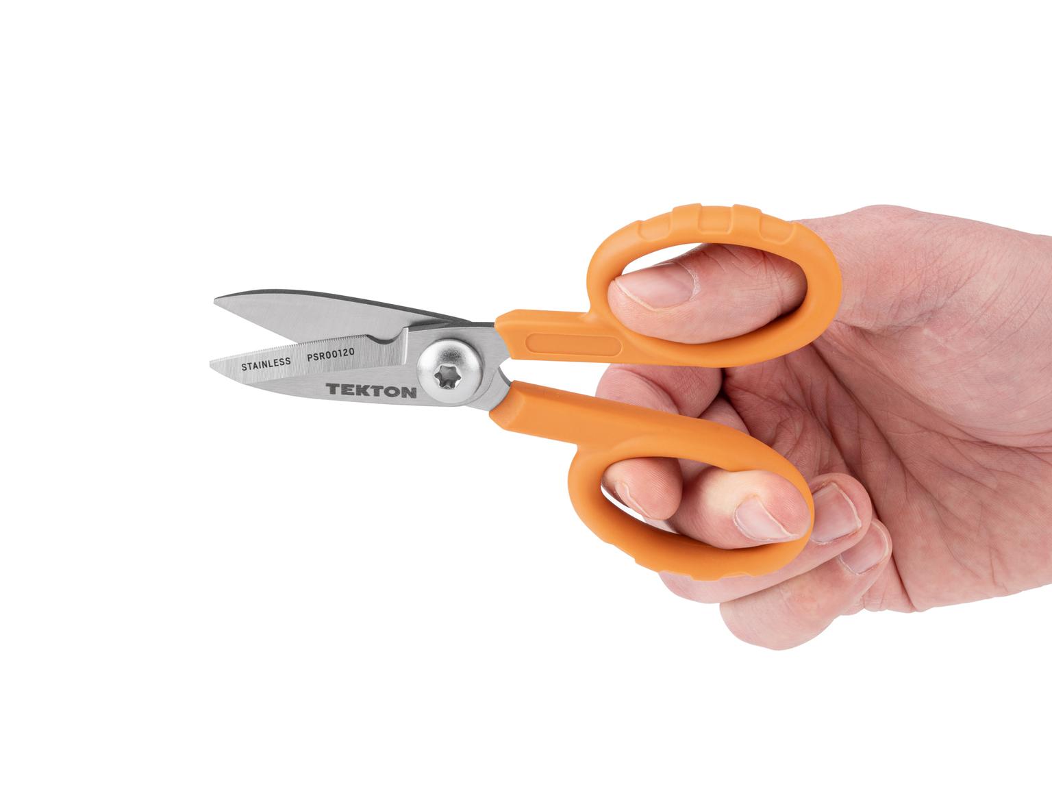 Person holding Tekton scissors. Item #PSR00120