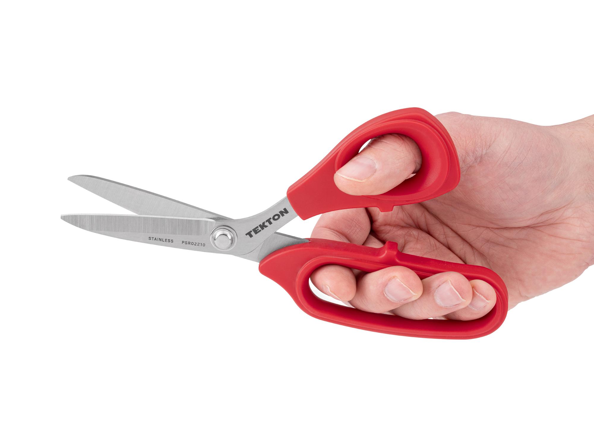 Person holding Tekton scissors. Item #PSR02210
