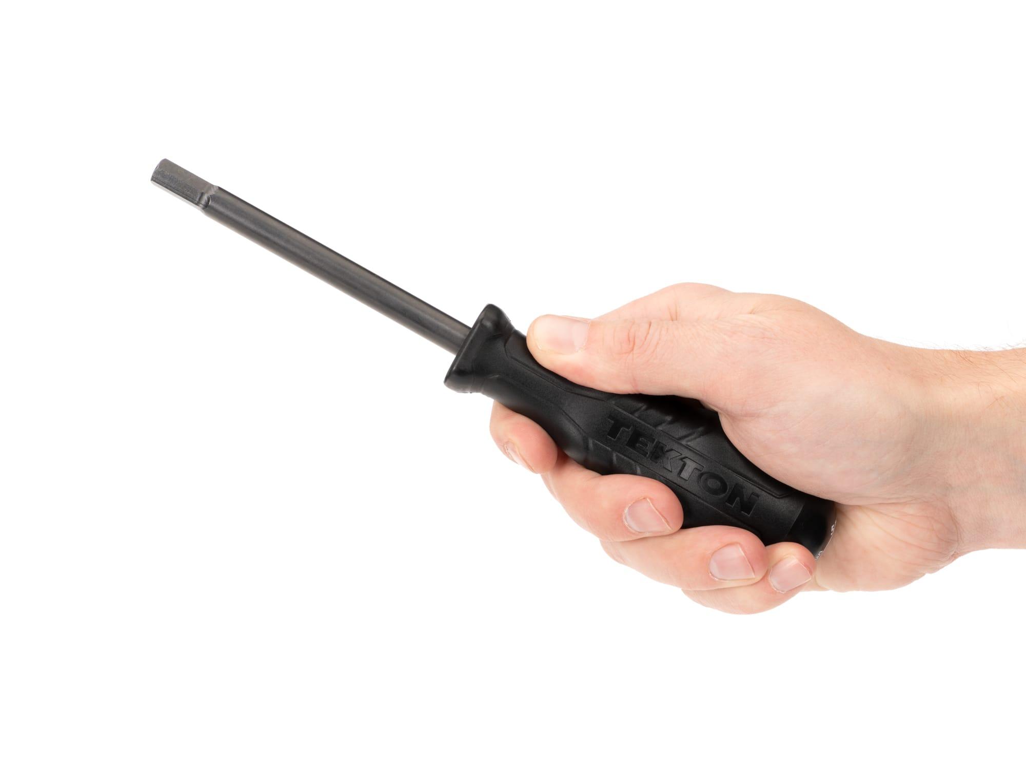 Person holding Tekton screwdriver. Item #DHX11313