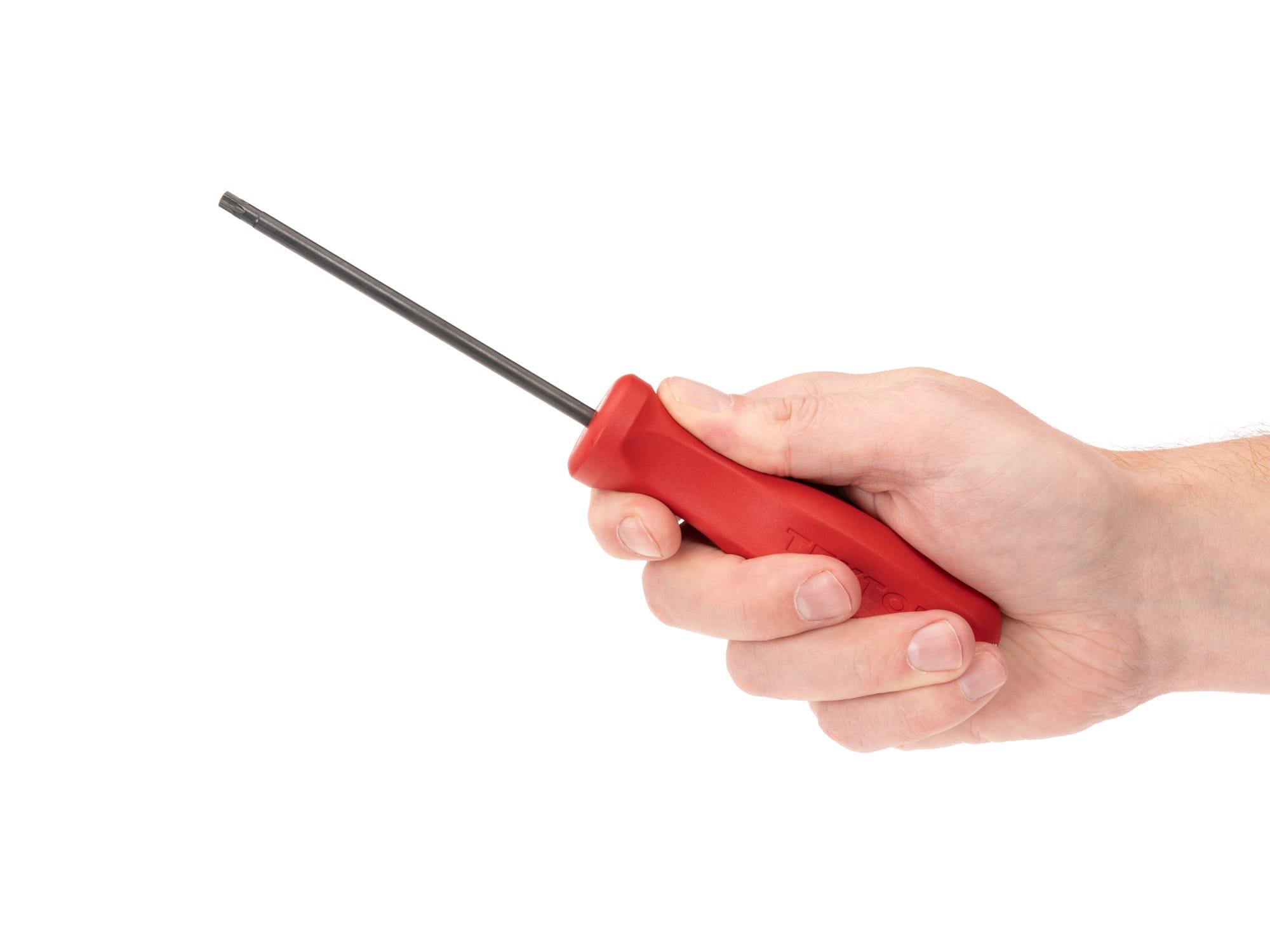 Person holding Tekton screwdriver. Item #DST11250