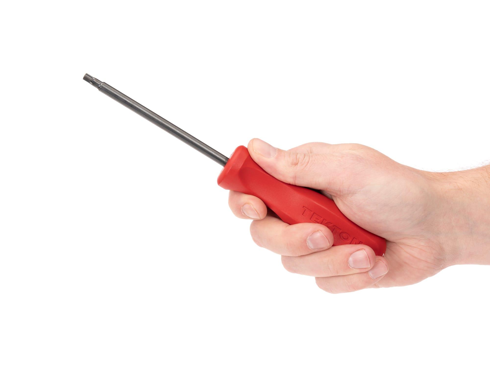 Person holding Tekton screwdriver. Item #DST11270