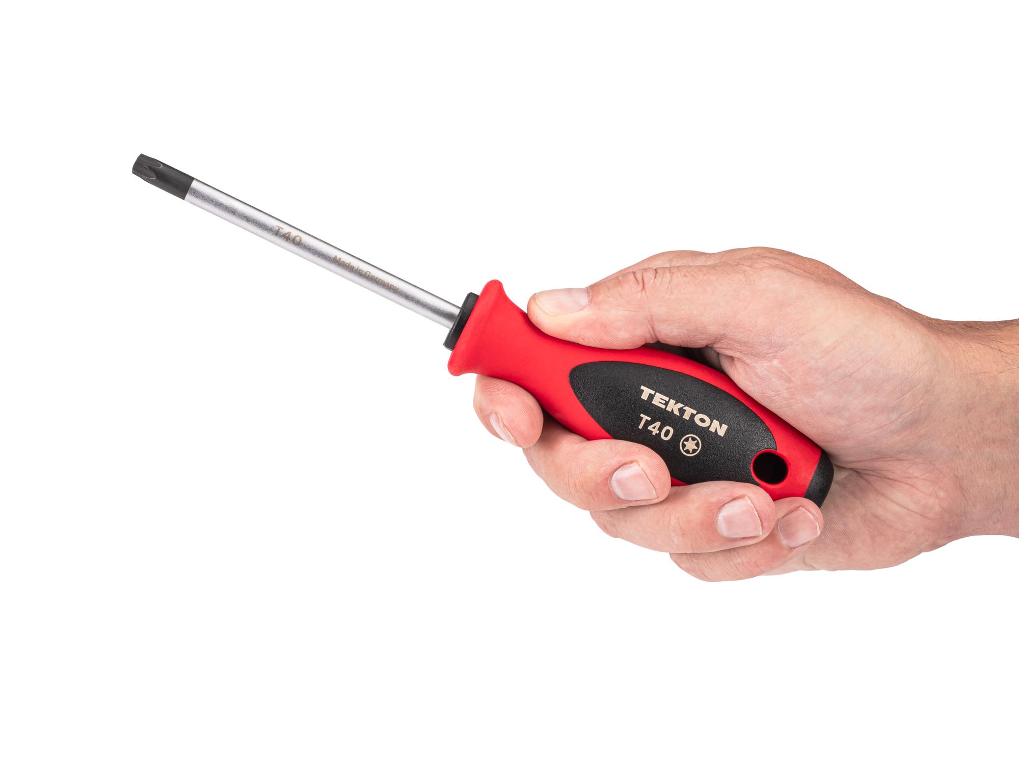 Person holding Tekton 4 inch screwdriver. Item #DWT01340