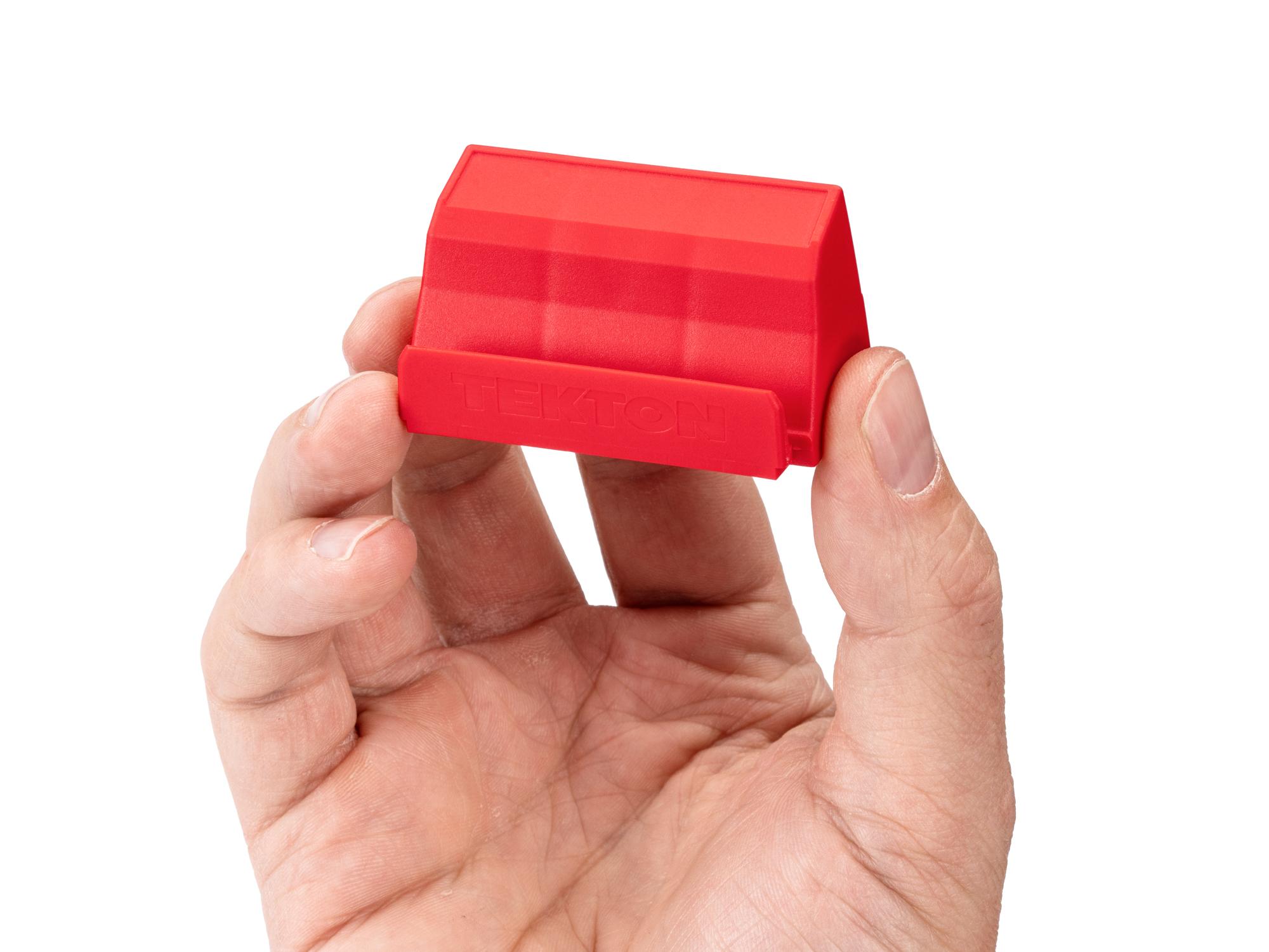 Person holding red Tekton modular screwdriver organization. Item #ODM11201