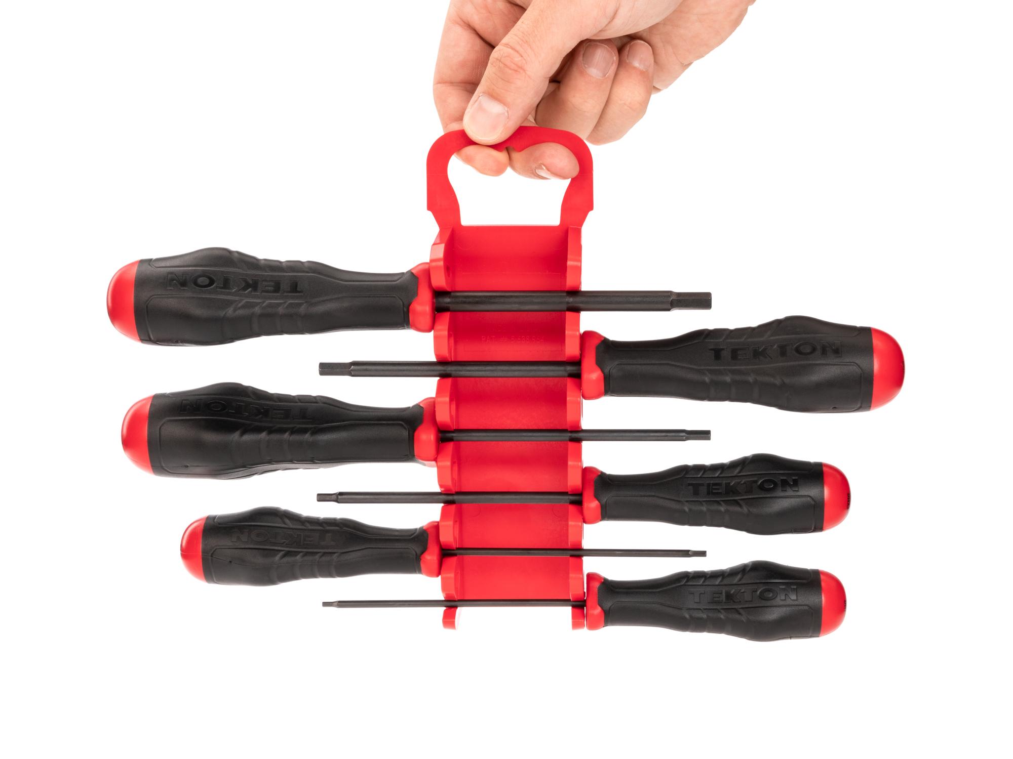 Person holding  Tekton holder screwdriver set. Item #DHX92006