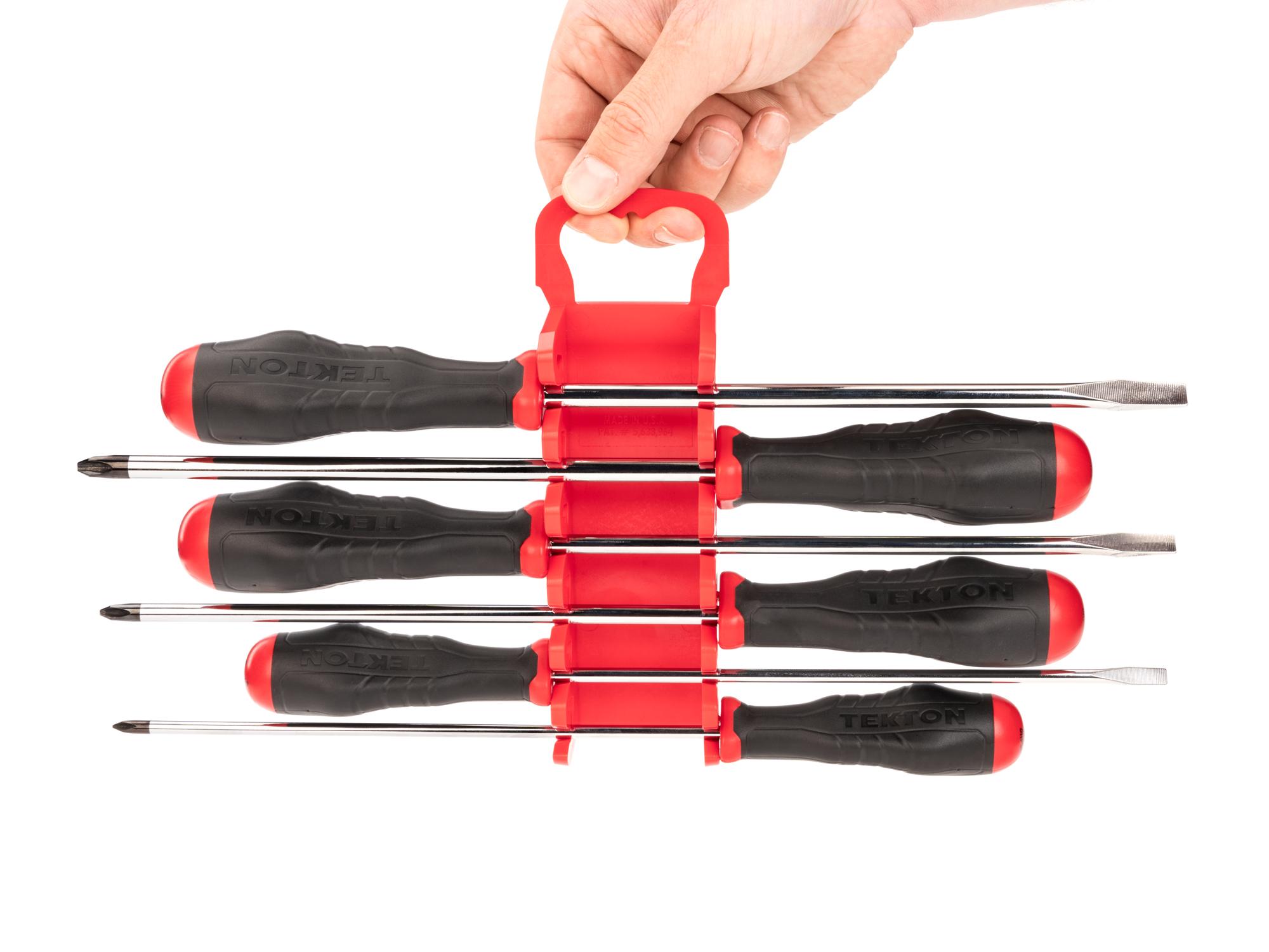 Person holding Tekton screwdriver set. Item #DRV43503