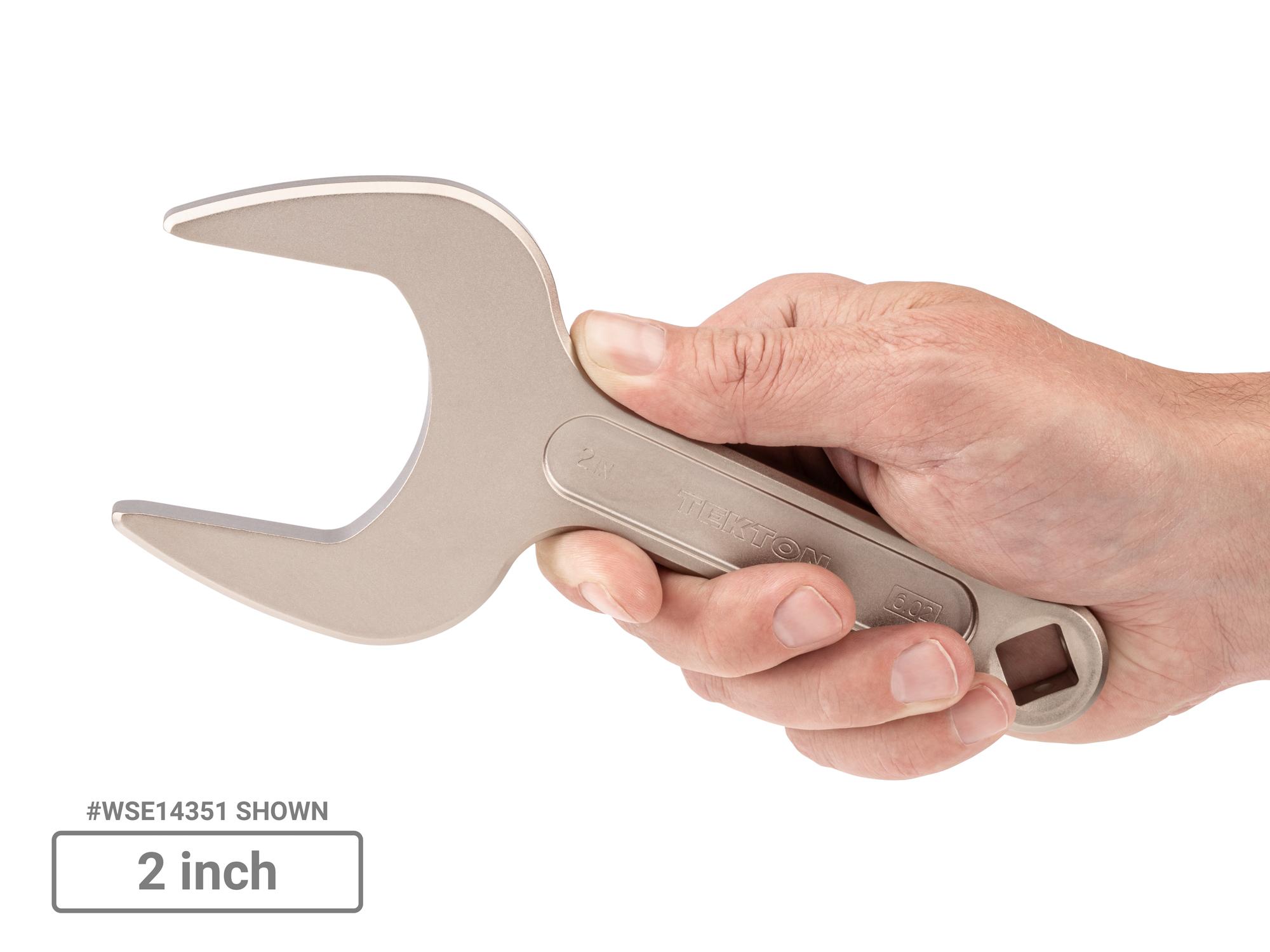 Person holding Tekton service wrench set. Item #WSE90102