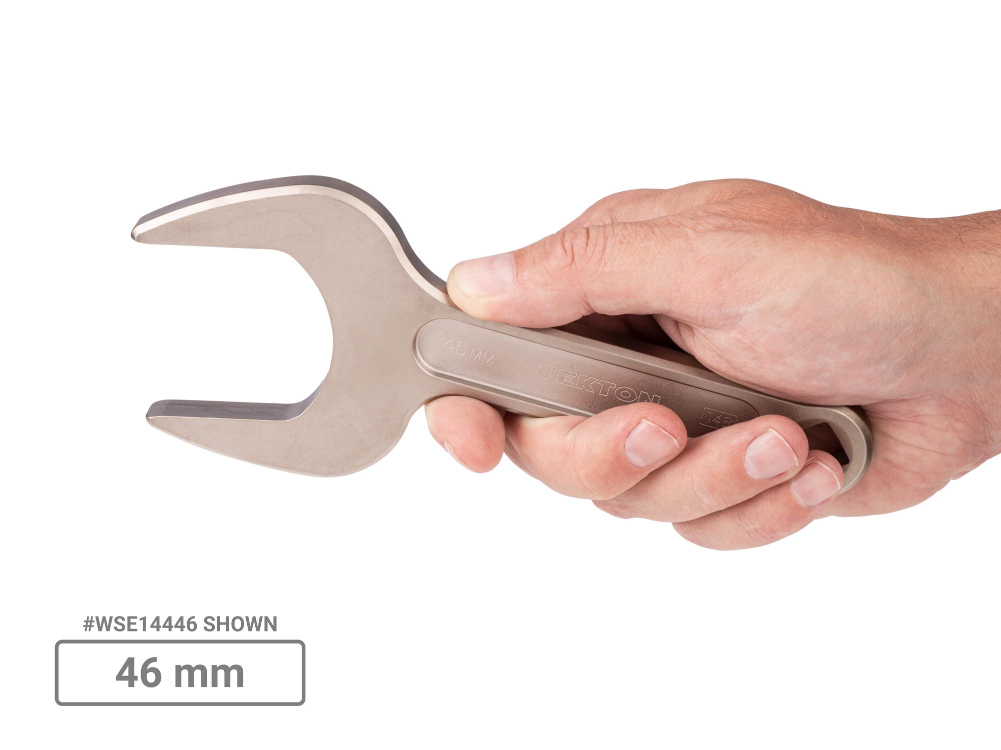 Person holding Tekton service wrench set. Item #WSE90203
