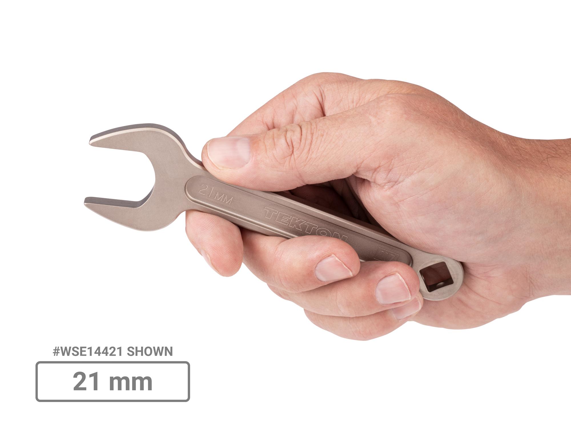 Person holding Tekton service wrench set. Item #WSE90201