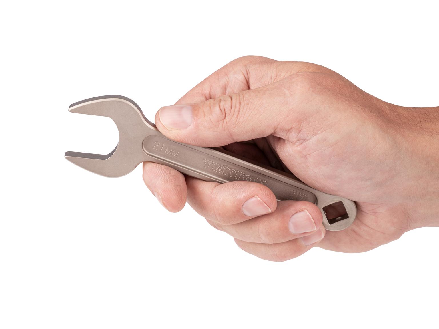 Person holding Tekton 21 millimeter service wrench set. Item #WSE14421