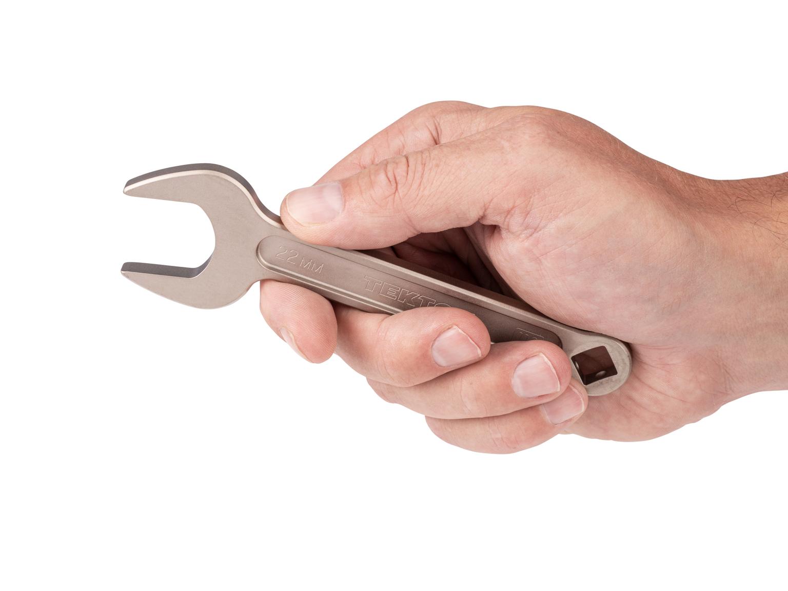 Person holding Tekton 22 millimeter service wrench set. Item #WSE14422
