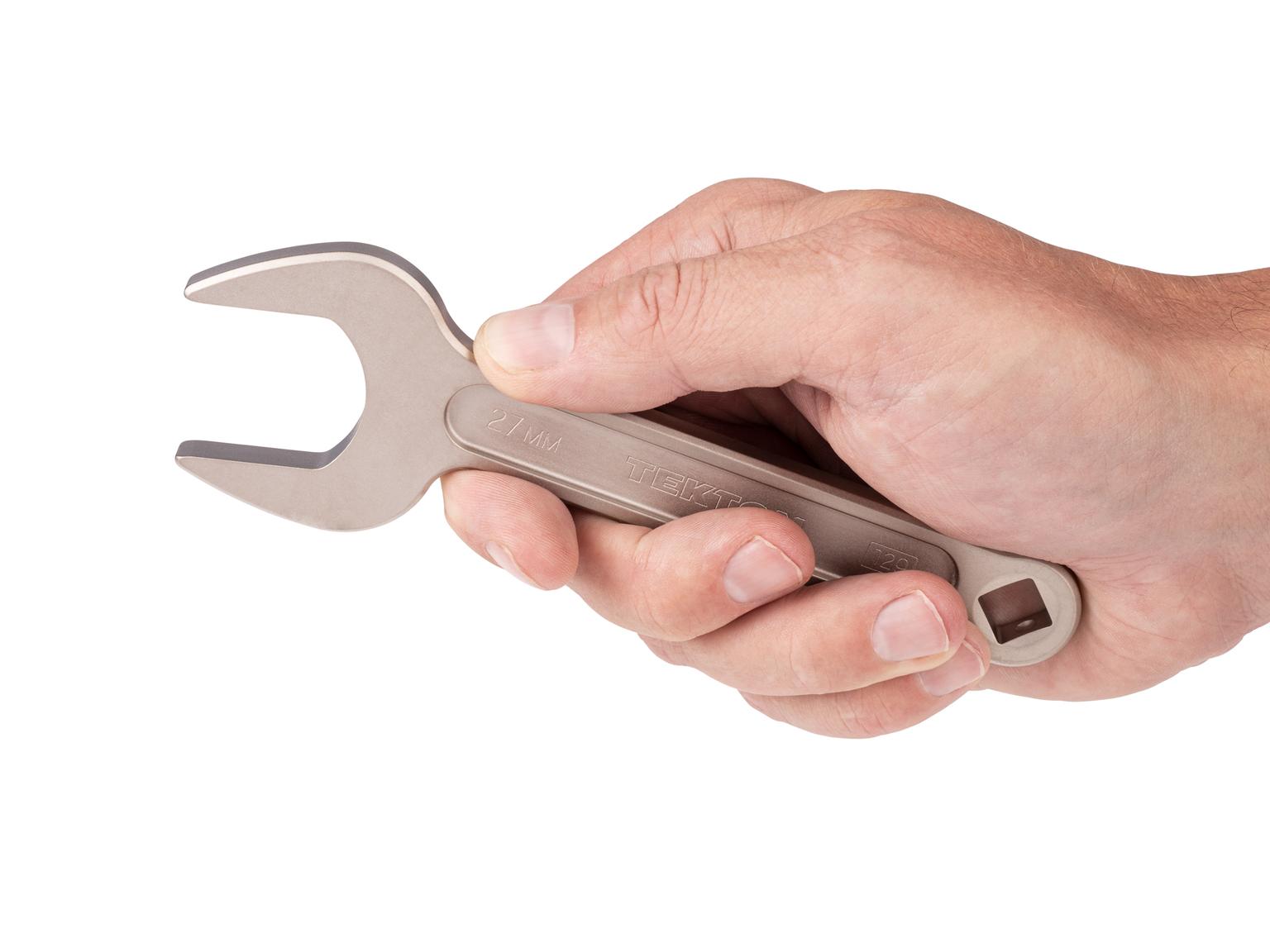 Person holding Tekton 27 millimeter service wrench set. Item #WSE14427