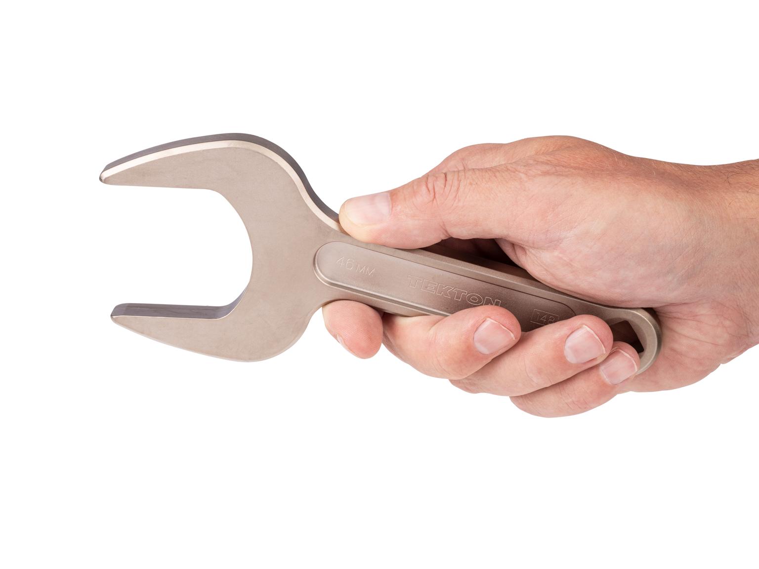 Person holding Tekton 46 millimeter service wrench set. Item #WSE14446