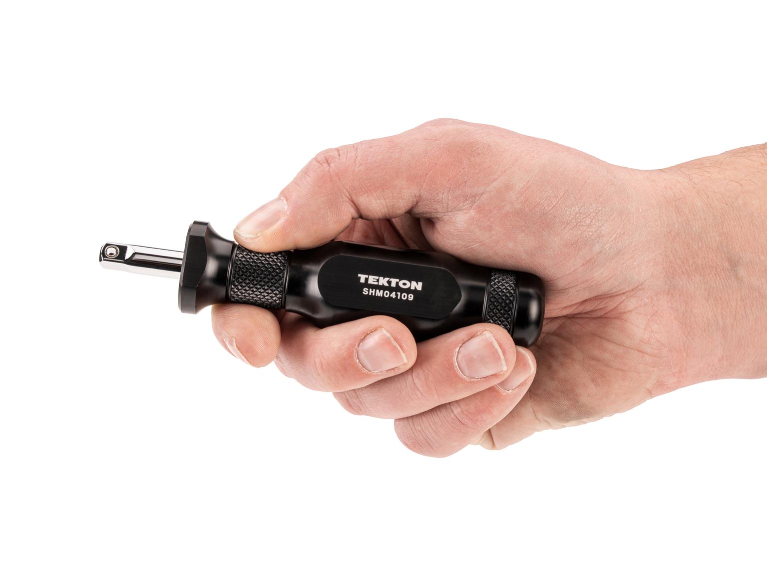 Person holding Tekton standard socket driver. Item #SHM04109