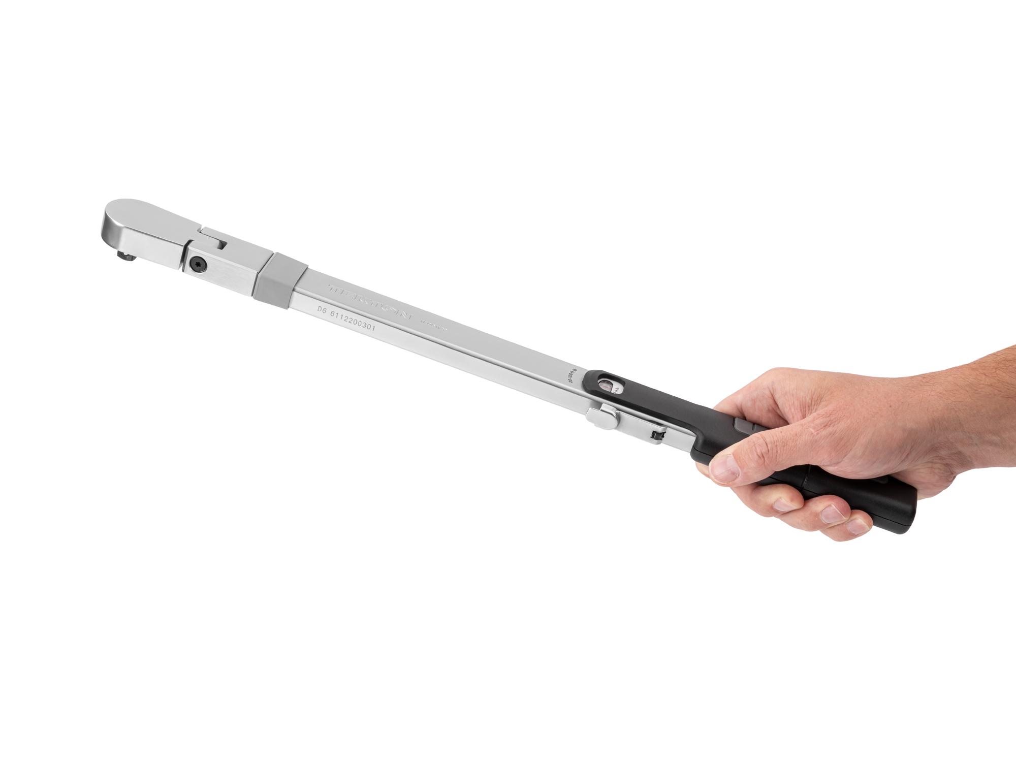 Person holding Tekton case split beam torque wrench. Item #TRQ61122