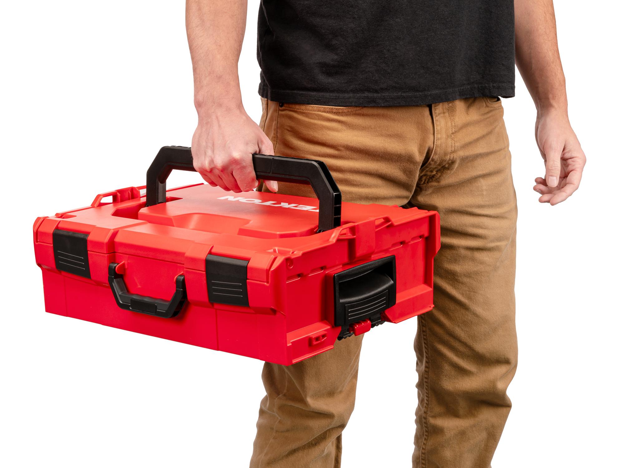 Person holding Tekton stacking organization system set. Item #OLB11022.