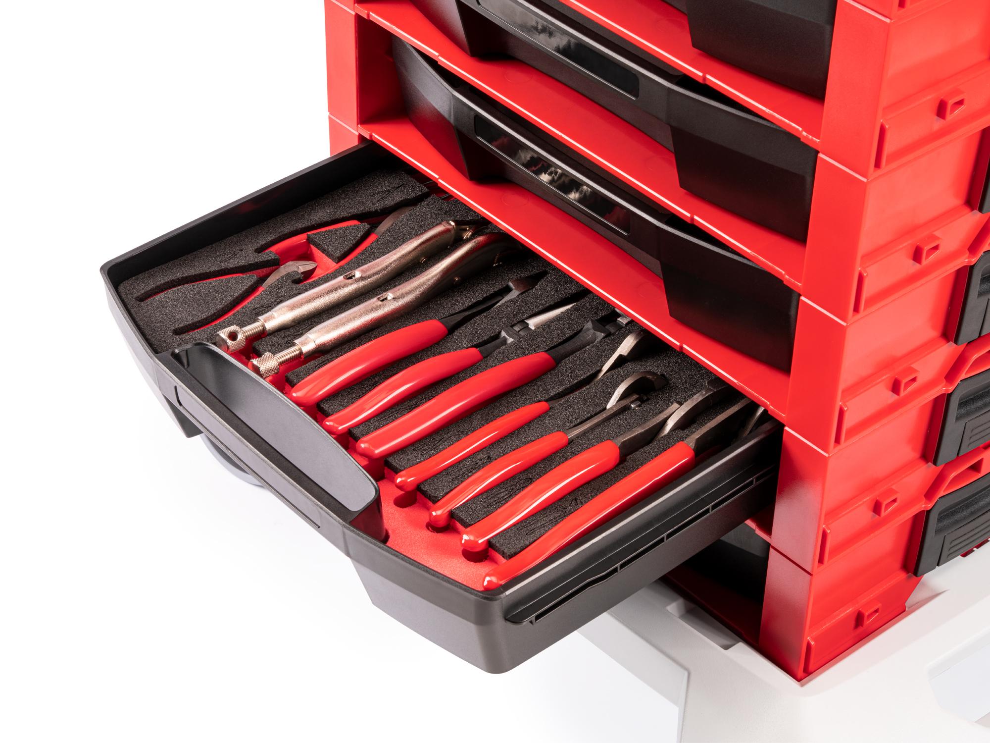 Front angled view of Tekton stacking organization system set in a tool cabinet drawer. Item #OLB94501.