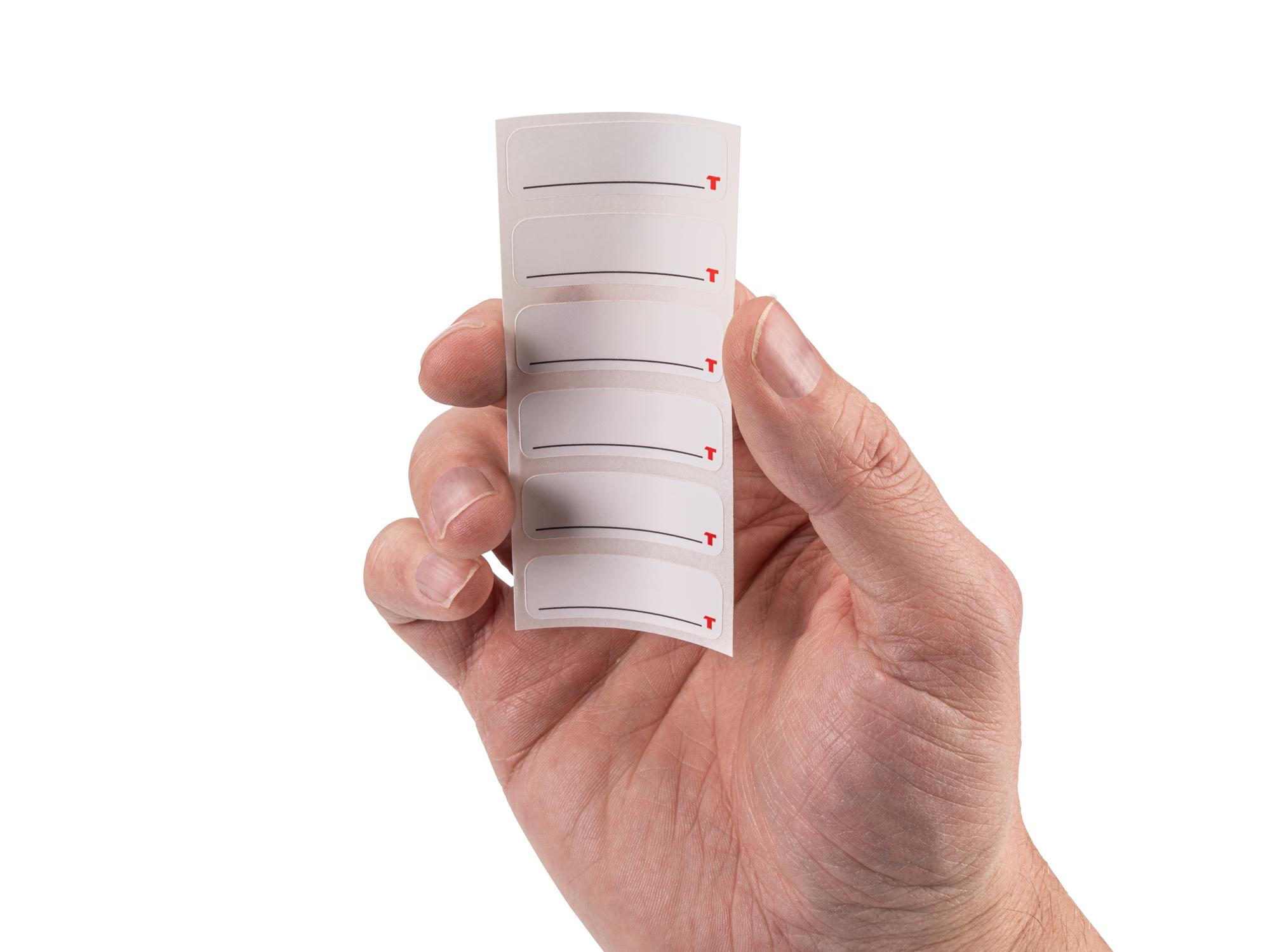 Person holding Tekton stacking organization system. Item #OLB98001